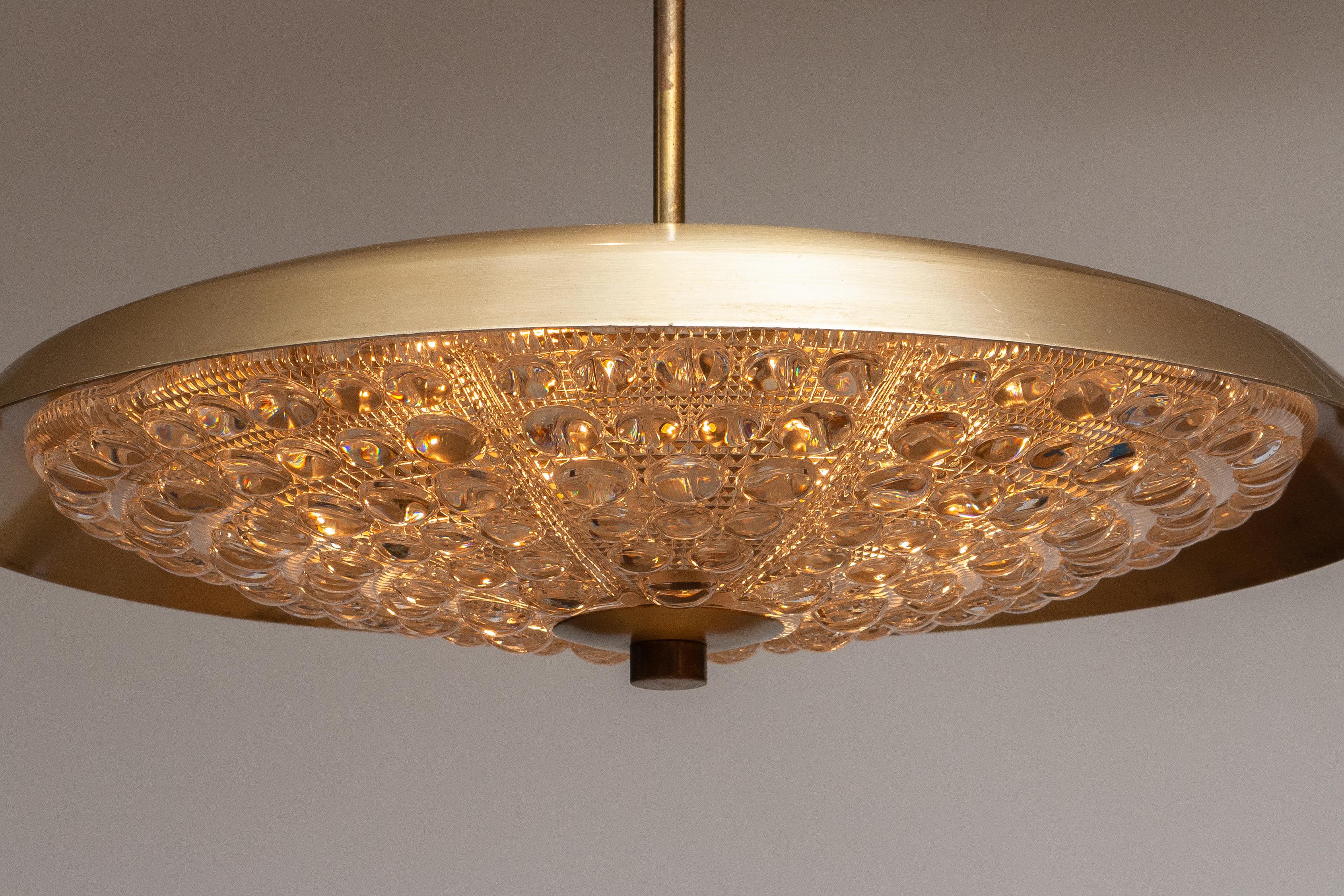 Mid-20th Century 1950s, Brass and Glass Pendant Lamp Designed by Carl Fagerlund for Orrefors