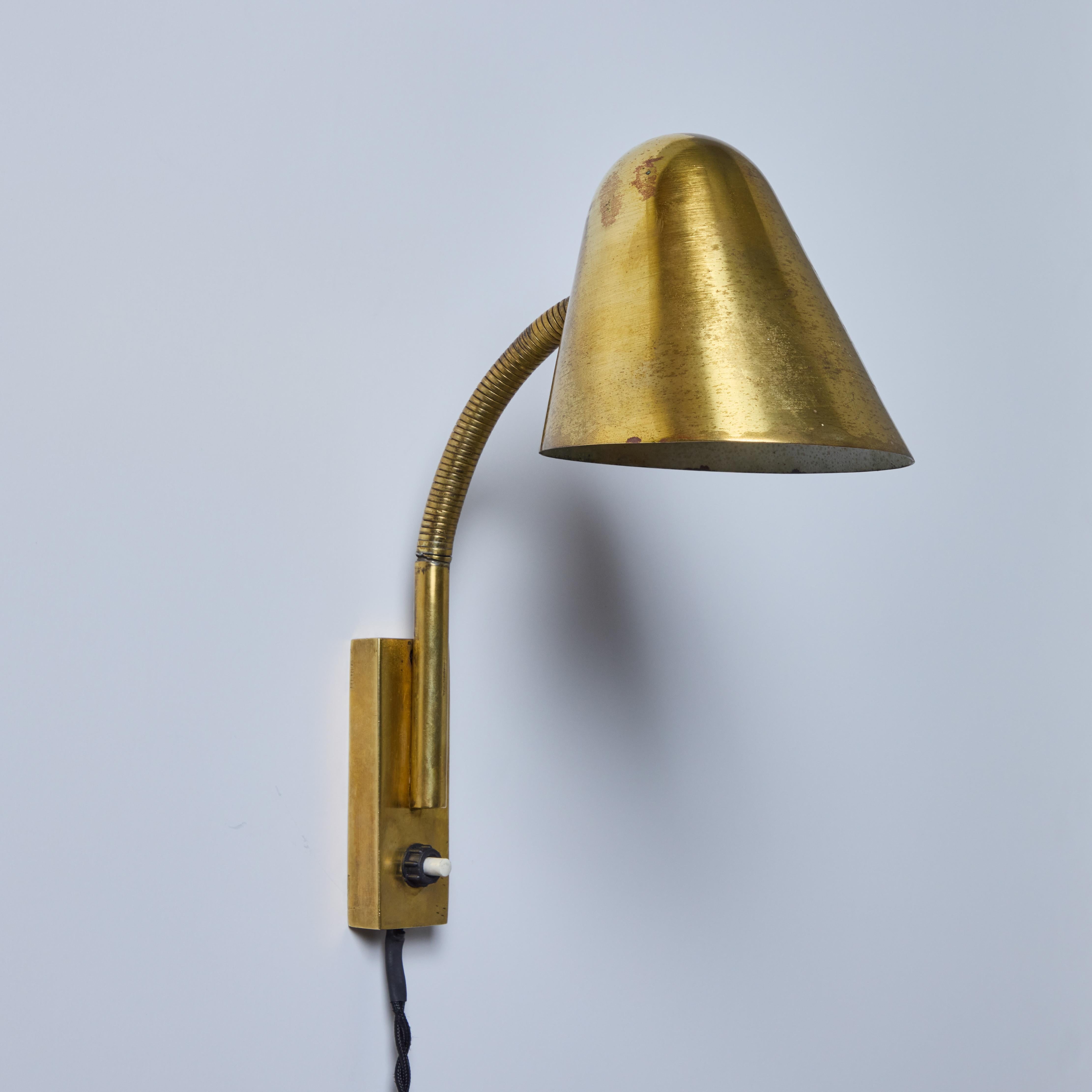 French 1950s Brass Articulating Wall Lamp Attributed to Jacques Biny For Sale