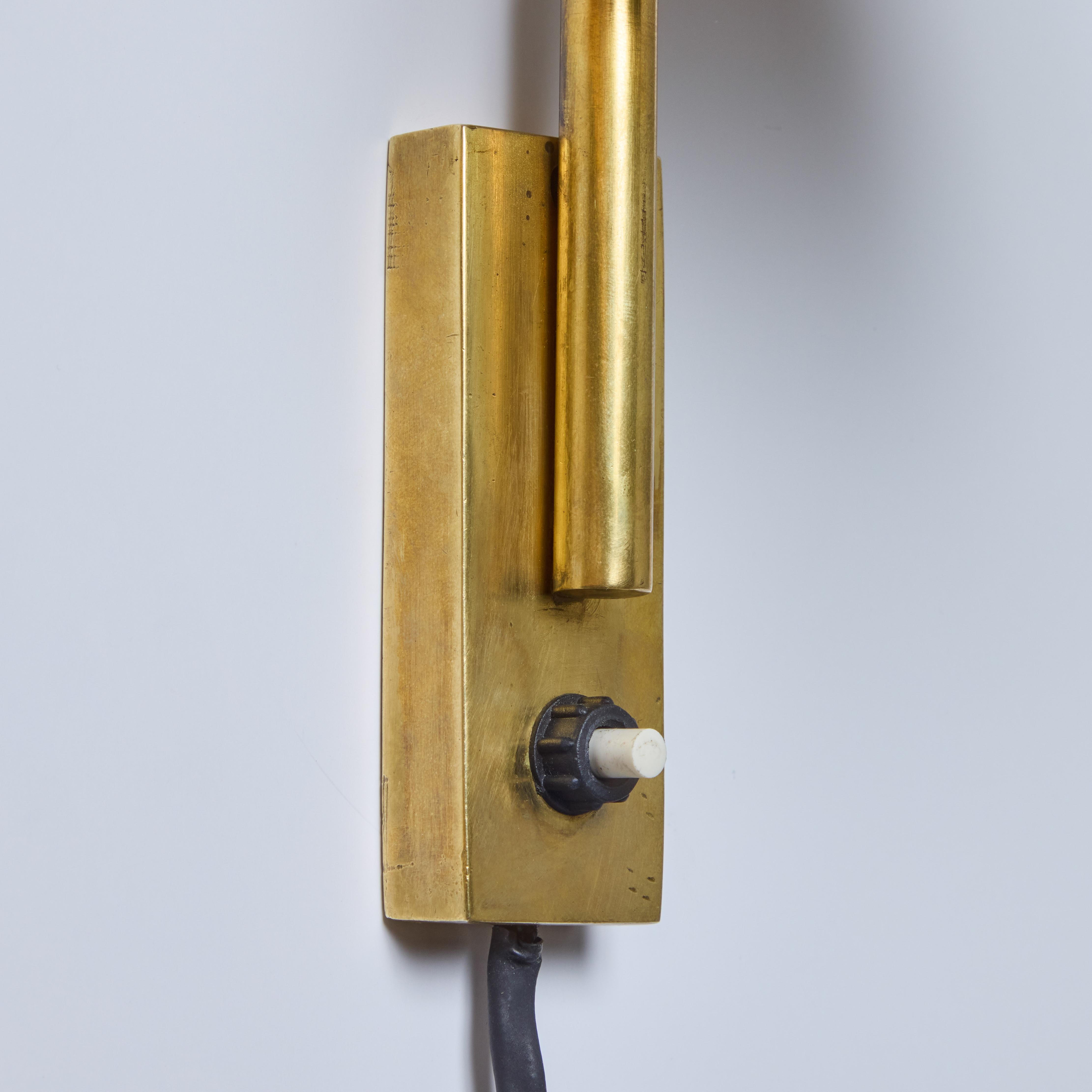 Metal 1950s Brass Articulating Wall Lamp Attributed to Jacques Biny For Sale