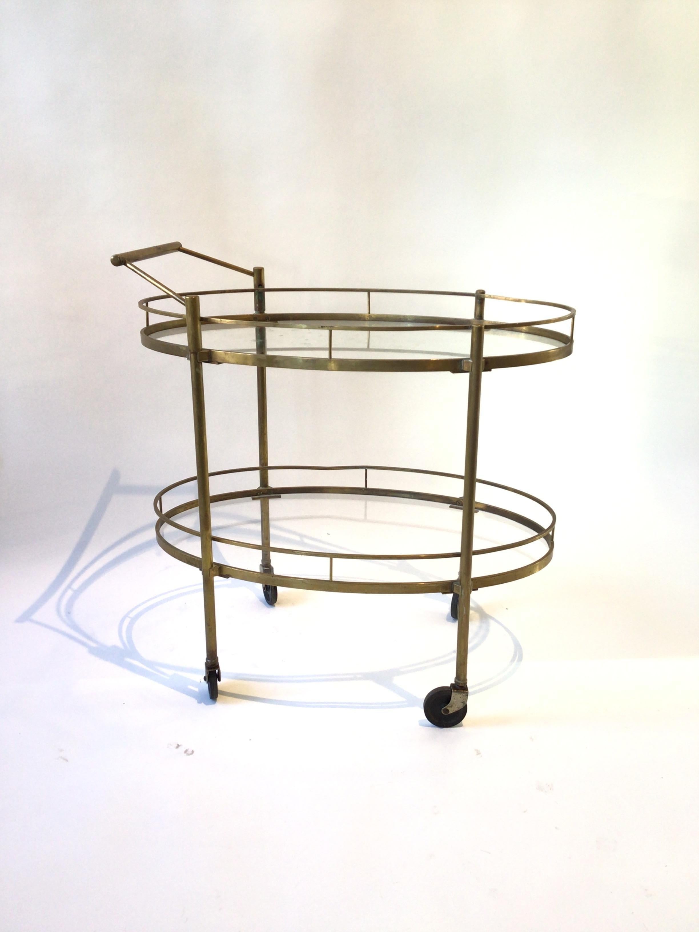 1950s 2 tier brass and glass bar cart.