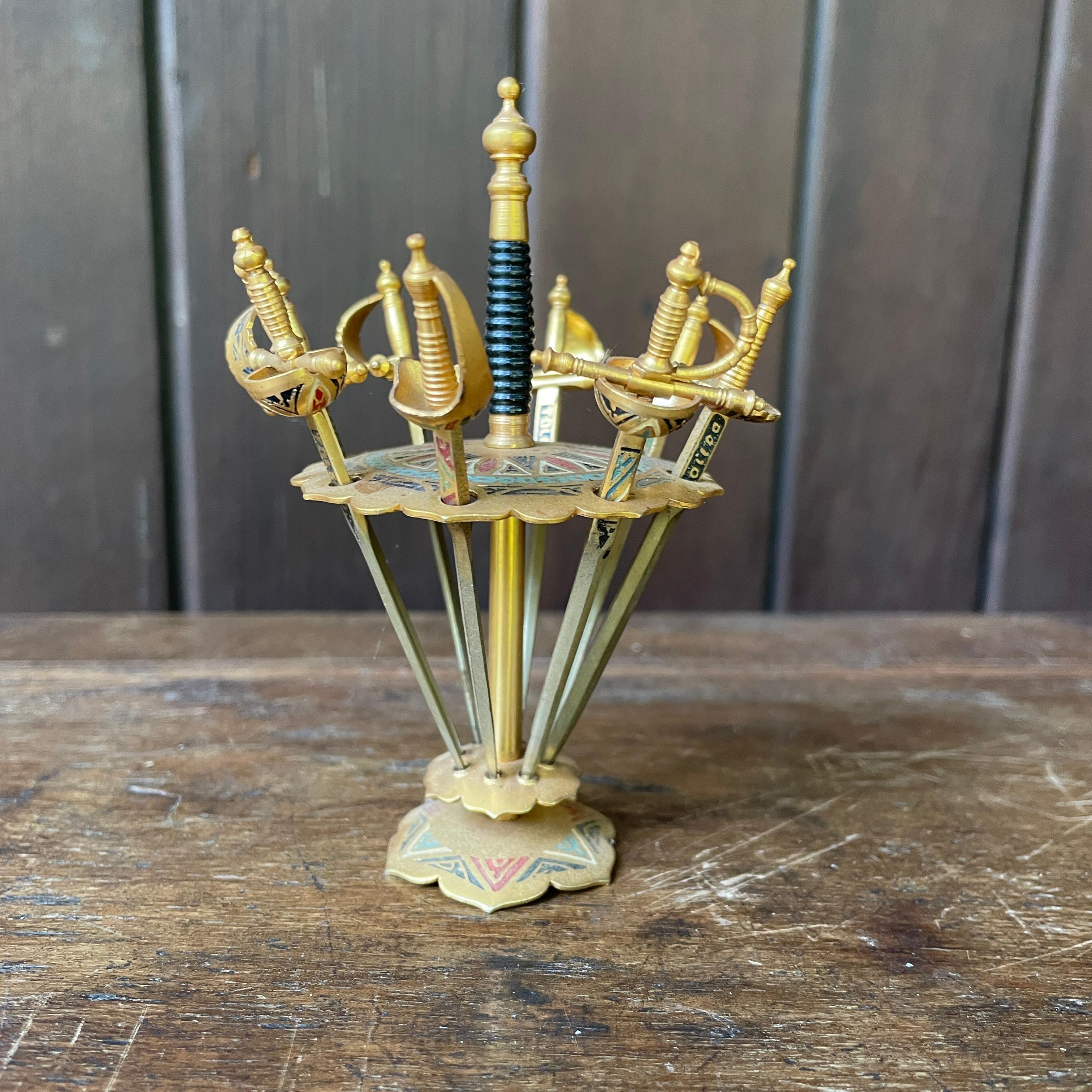 Mid-Century Modern 1950s Brass + Enamel Martini Cocktail Swords Vintage Mid-Century Mad Men en vente