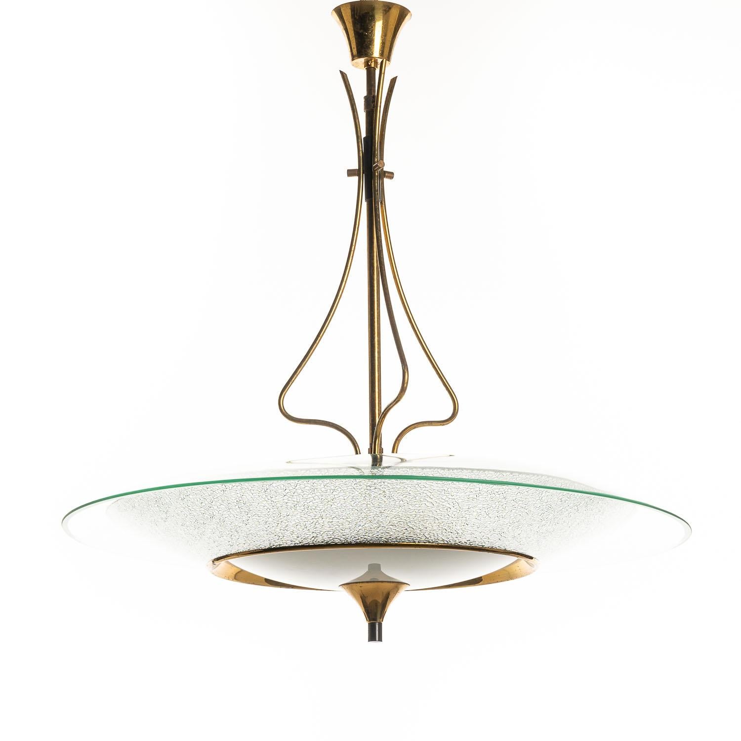 This Fontana Arte-inspired hanging pendant lamp is the perfect piece for those looking to capture a slice of the mid-century design ethos. Understated at first glance, yet full of character and charm the more you learn. This lamp has a stunning