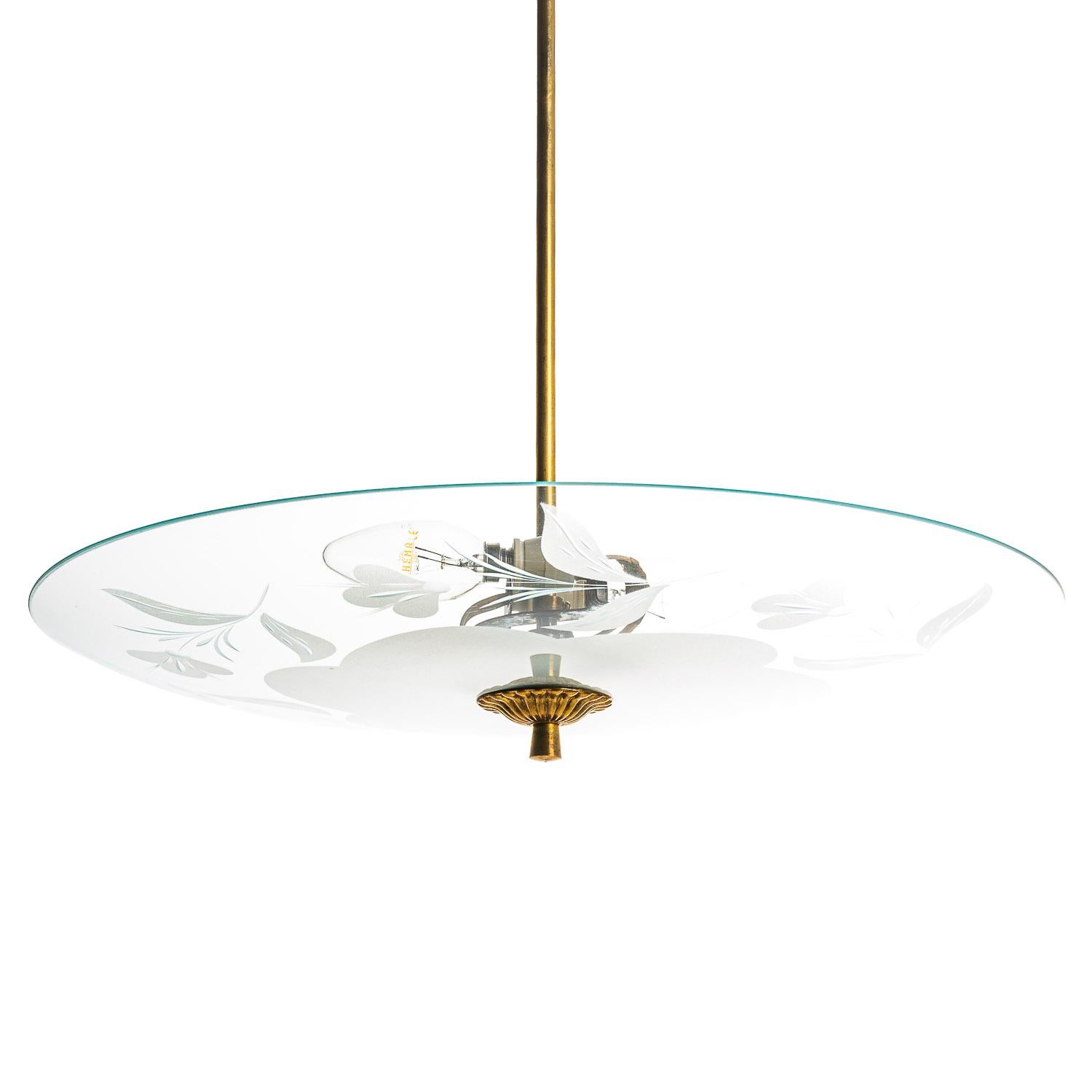 This stylish pendant lamp is decorated with a delicate floral pattern engraved onto a frosted satin glass reflector. In the centre are two electrical E27 sockets. This unique feature creates a beautiful soft-lighting effect.