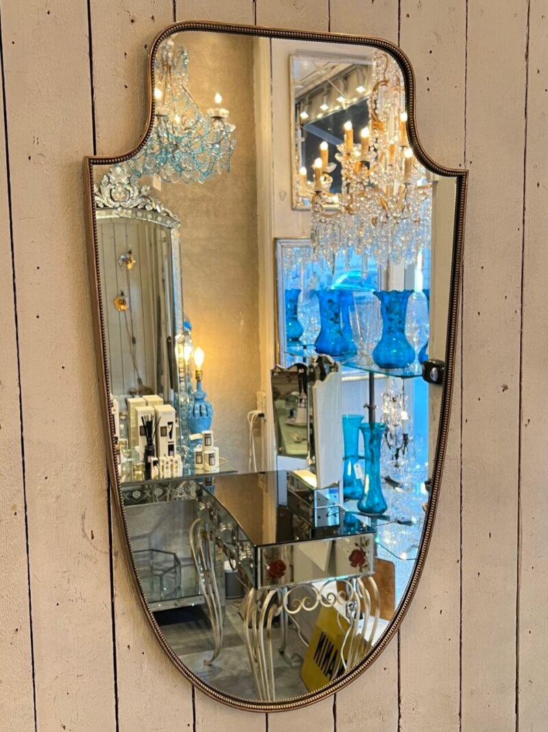 Italian 1950s Brass Mirror with Beading-Shield Like Shape, Italy For Sale