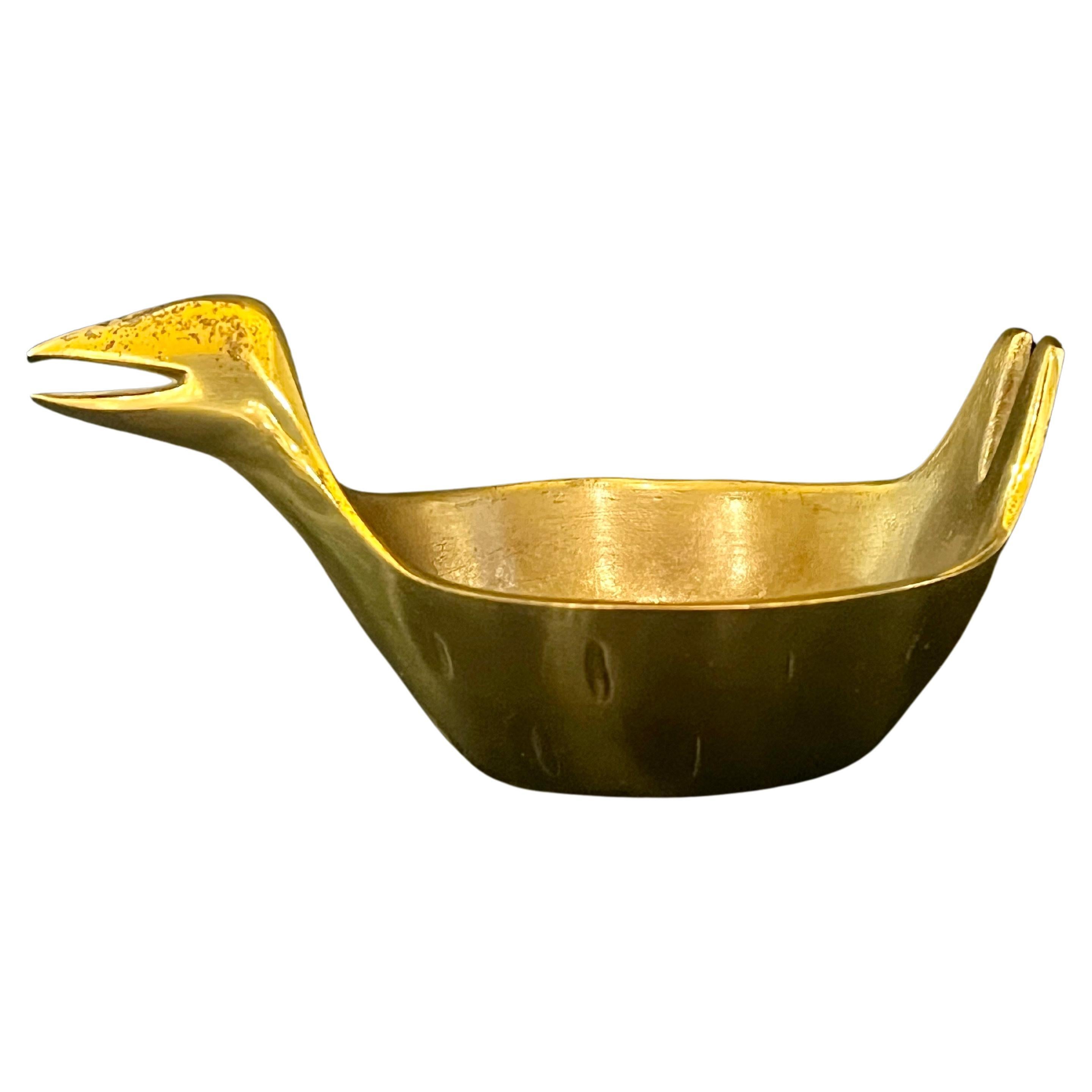 Whimsical patinated sold brass bird ashtray circa 1950's great piece original finish, can be used as catch it all.a must for mid century Danish modern home decor.