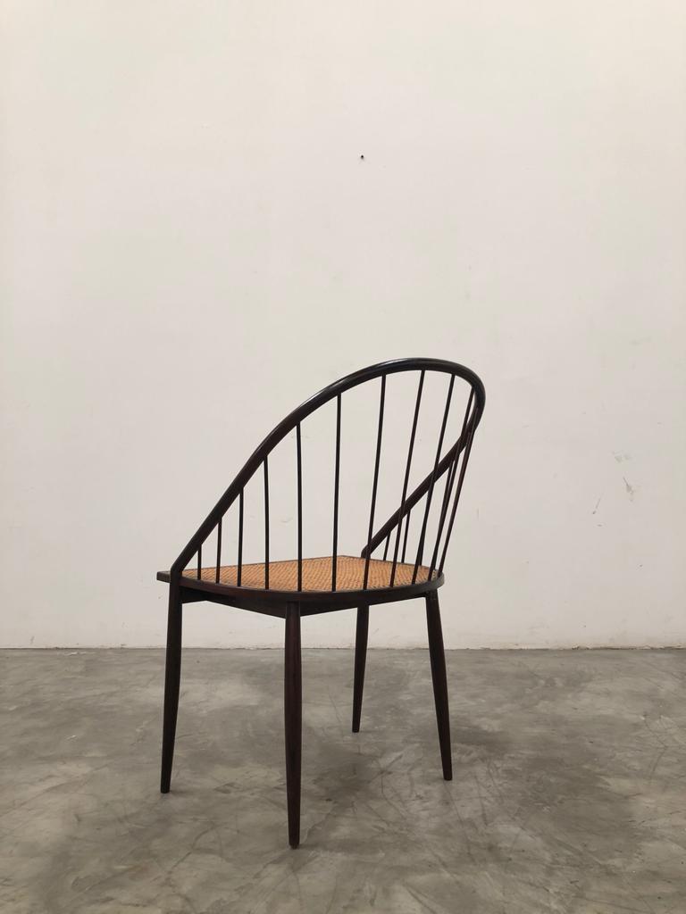 The set of six chairs crafted by Joaquim Tenreiro embodies a unique blend of aesthetic innovation, practicality, and cultural resonance that distinguishes them as remarkable pieces in the realm of mid-20th-century Brazilian furniture design.

At the