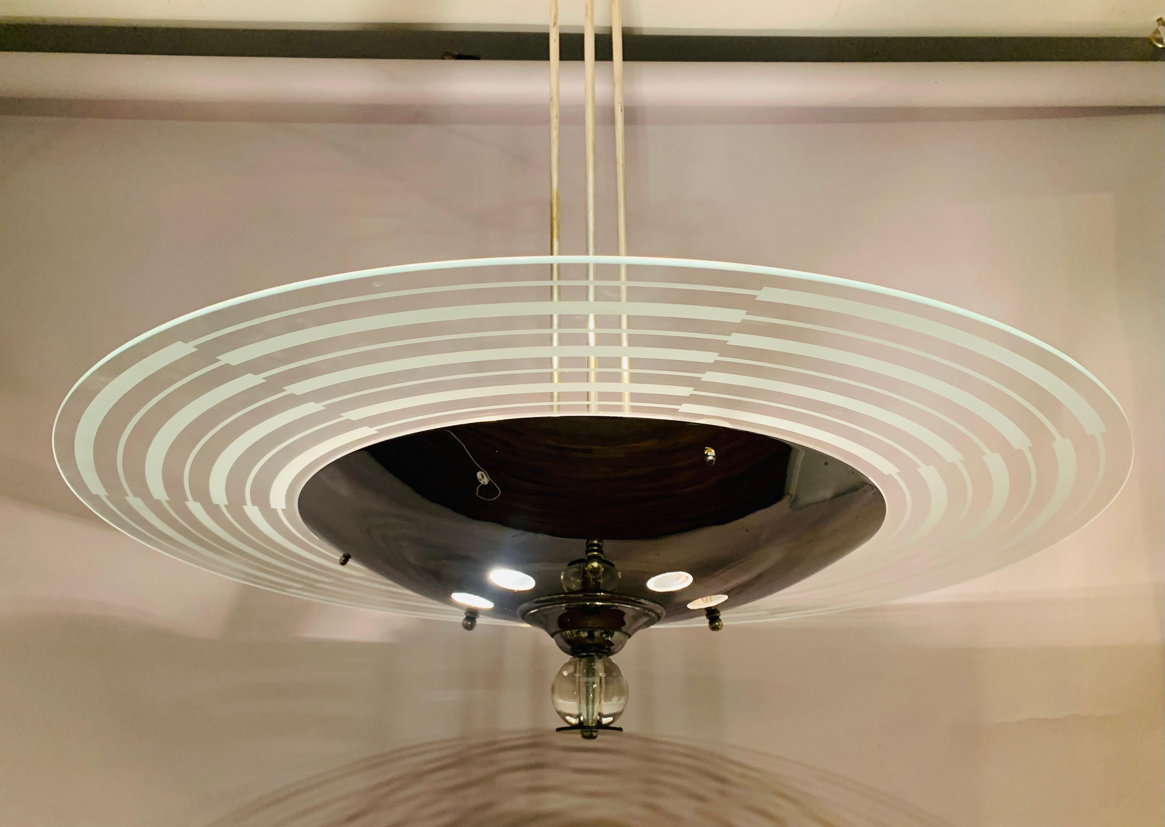 A stunning one-off 1950s British Art Deco chandelier with a clear and etched glass Saturn ring. The chandelier is constructed from a combination of vintage and specially designed unique components such as the Saturn right which has been recently