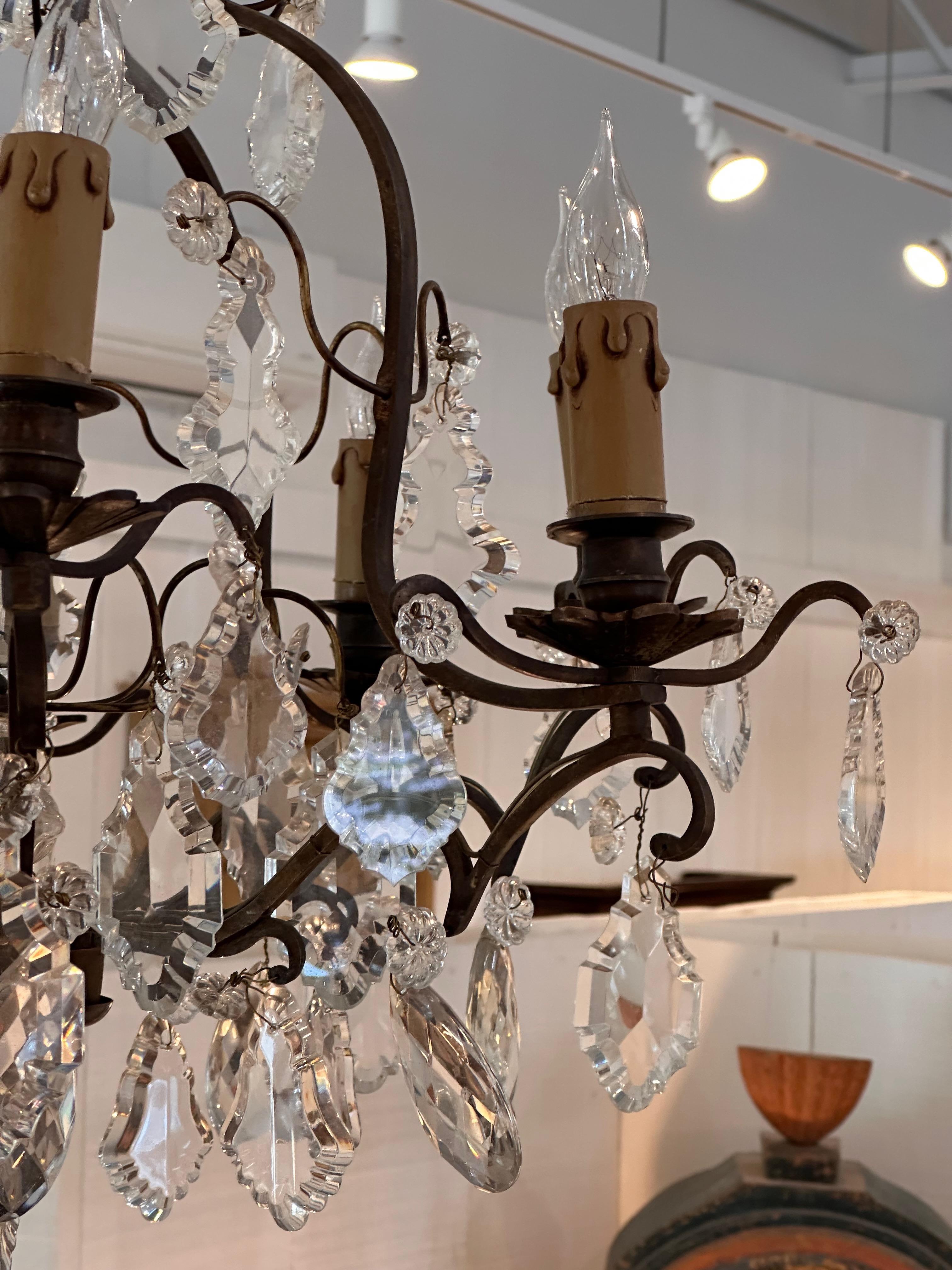 Bronze and Crystal Chandelier. Perfect for rooms with lower ceiling. Made in the 1950s.