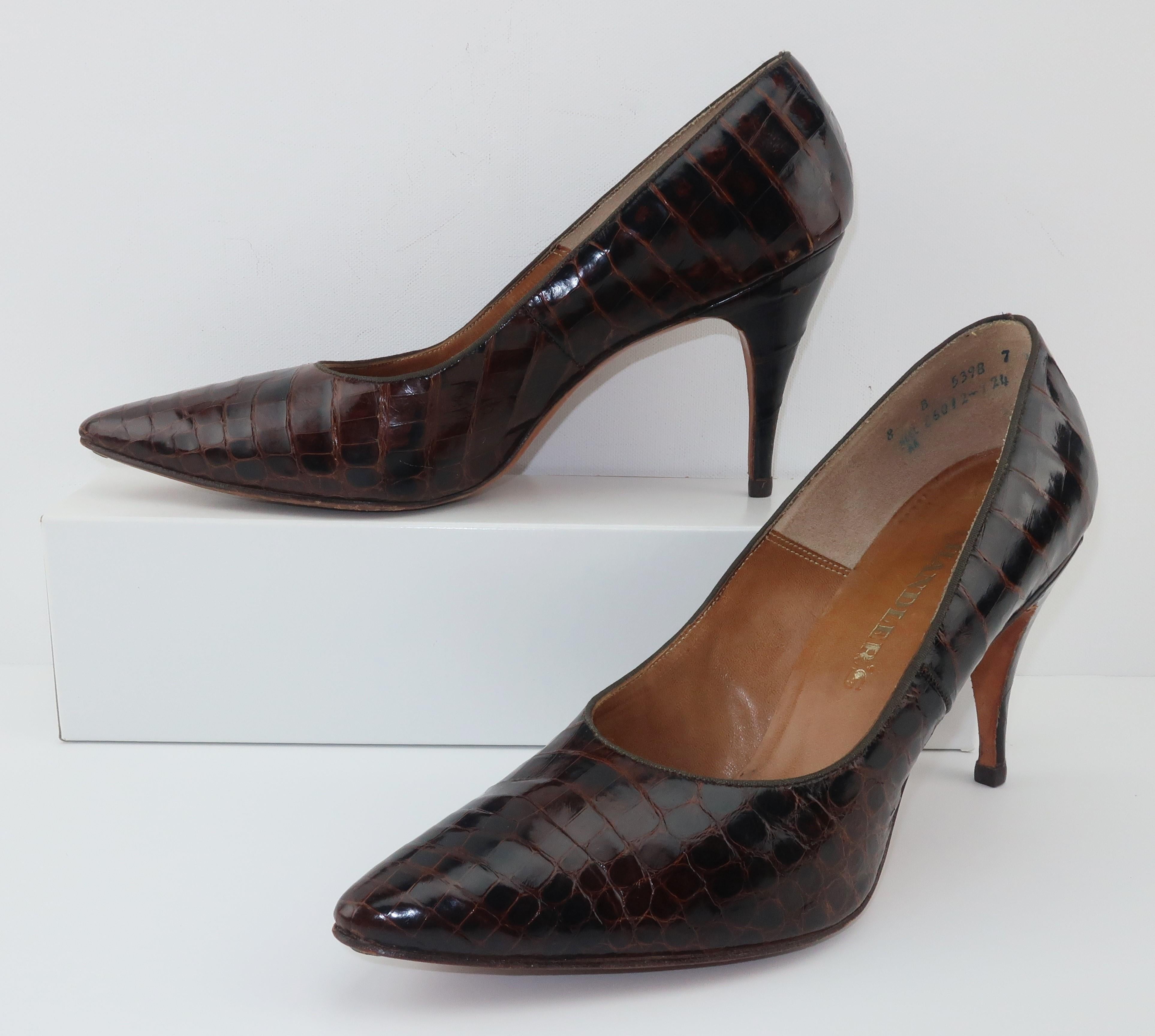 These timeless 1950’s brown alligator pointy toe pumps are a seasonless look ... equally as stylish with summer linens and winter tweeds.  The classic stiletto heel measures 3.5
