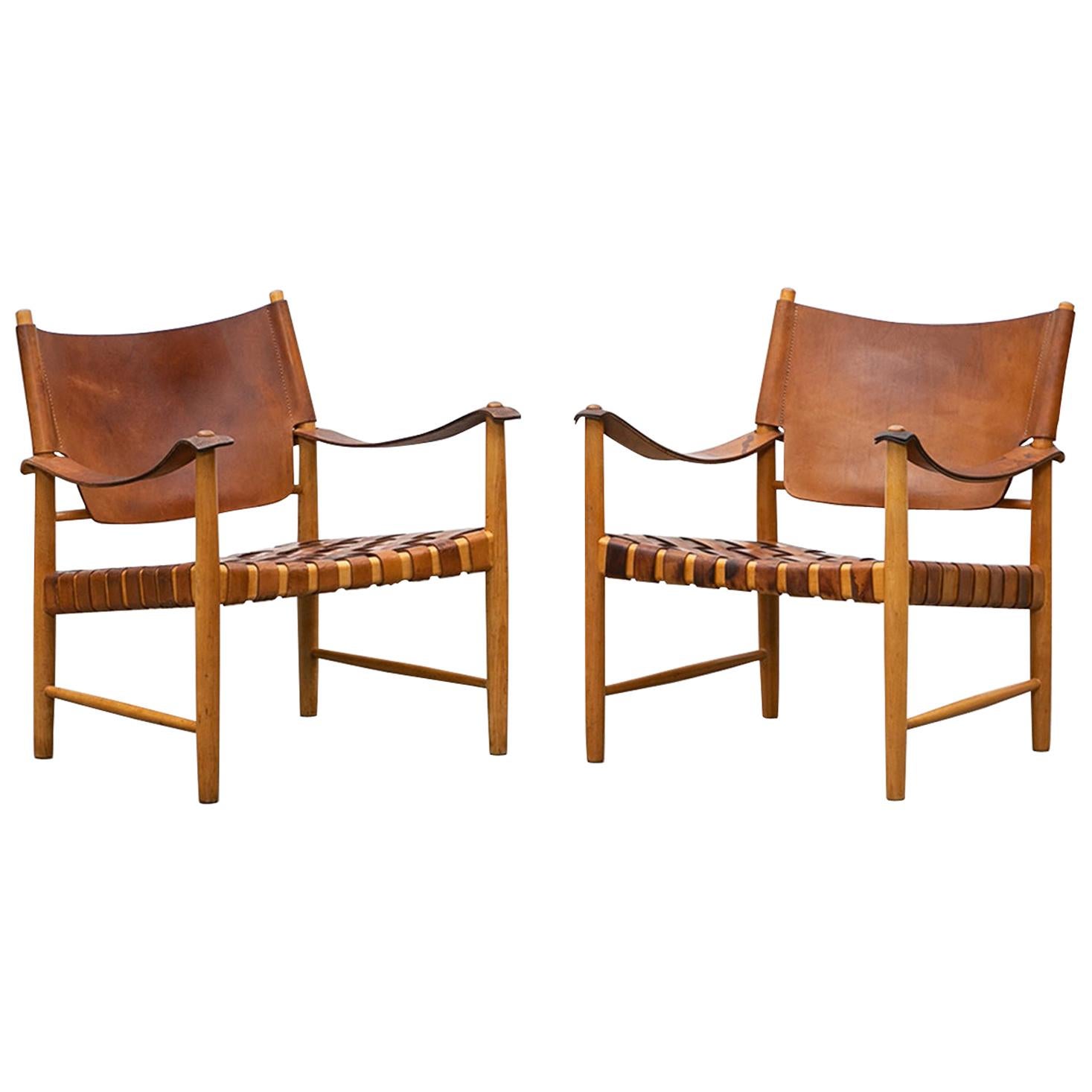 1950s Brown Leather and Oak Safari Lounge Chairs