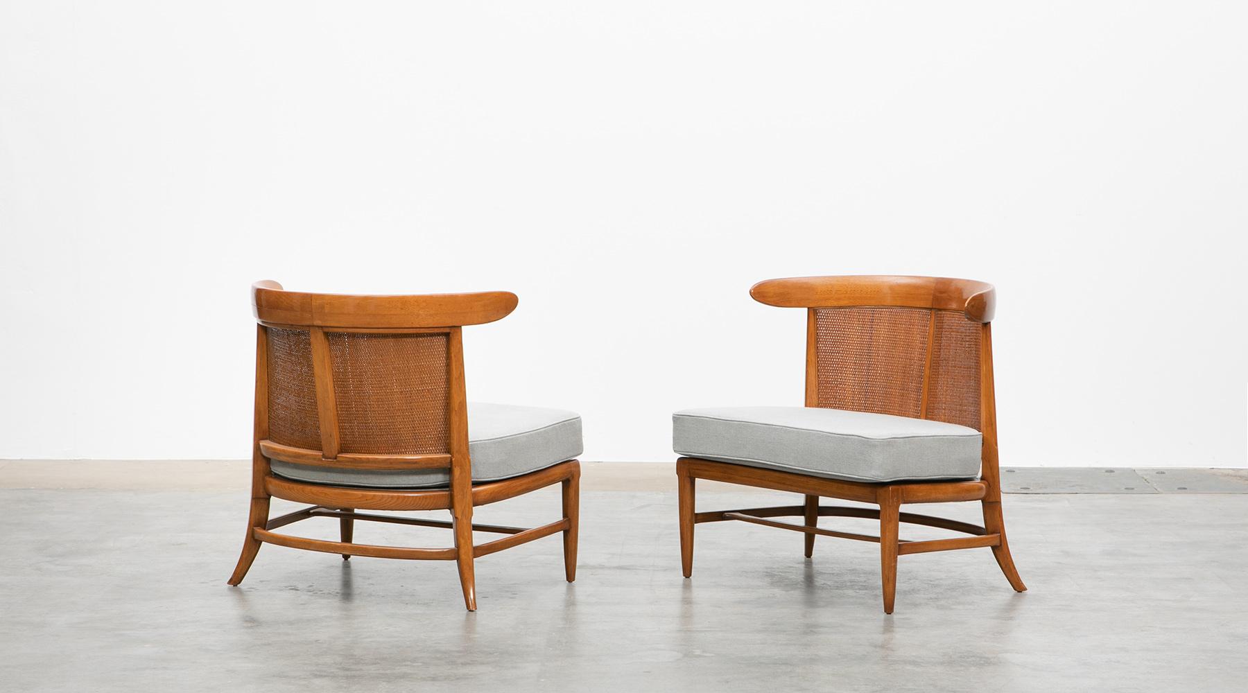 Walnut and cane, lounge chairs, Lubberts & Mulder, 1950s, USA.

Pair of curved caned back lounge chairs designed by John Lubberts and Lambert Mulder in America in circa 1950s. These low slung lounge chairs look great from any angle. They are