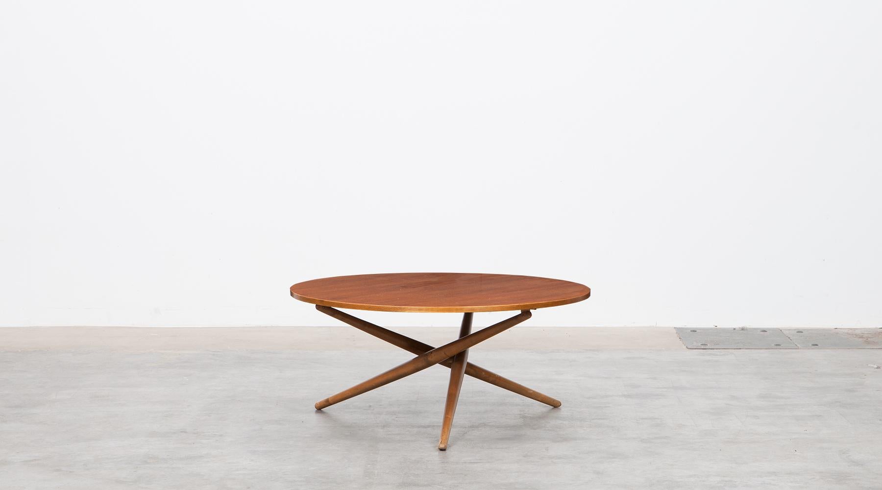 Eat and tea table with tabletop in walnut by Jürg Bally, Switzerland, 1951.

Iconic slim and graceful wooden eat and tea table by Swiss Jürg Bally from 1951. Walnut tabletop. This model strongly reminds of a 1955 side table by US designer T.H.