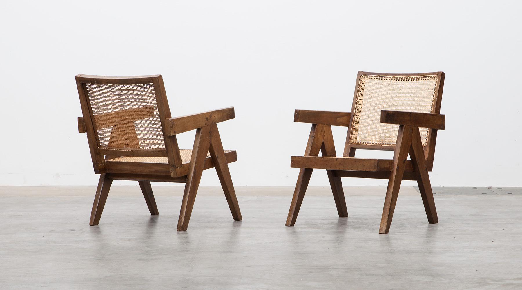 Pair of lounge chairs designed by Pierre Jeanneret in teak, Chandigarh, India, 1955

These original lounge chairs designed by Pierre Jeanneret in teak with woven cane on the seat and curved backrest appears in beautiful patina. Considering India