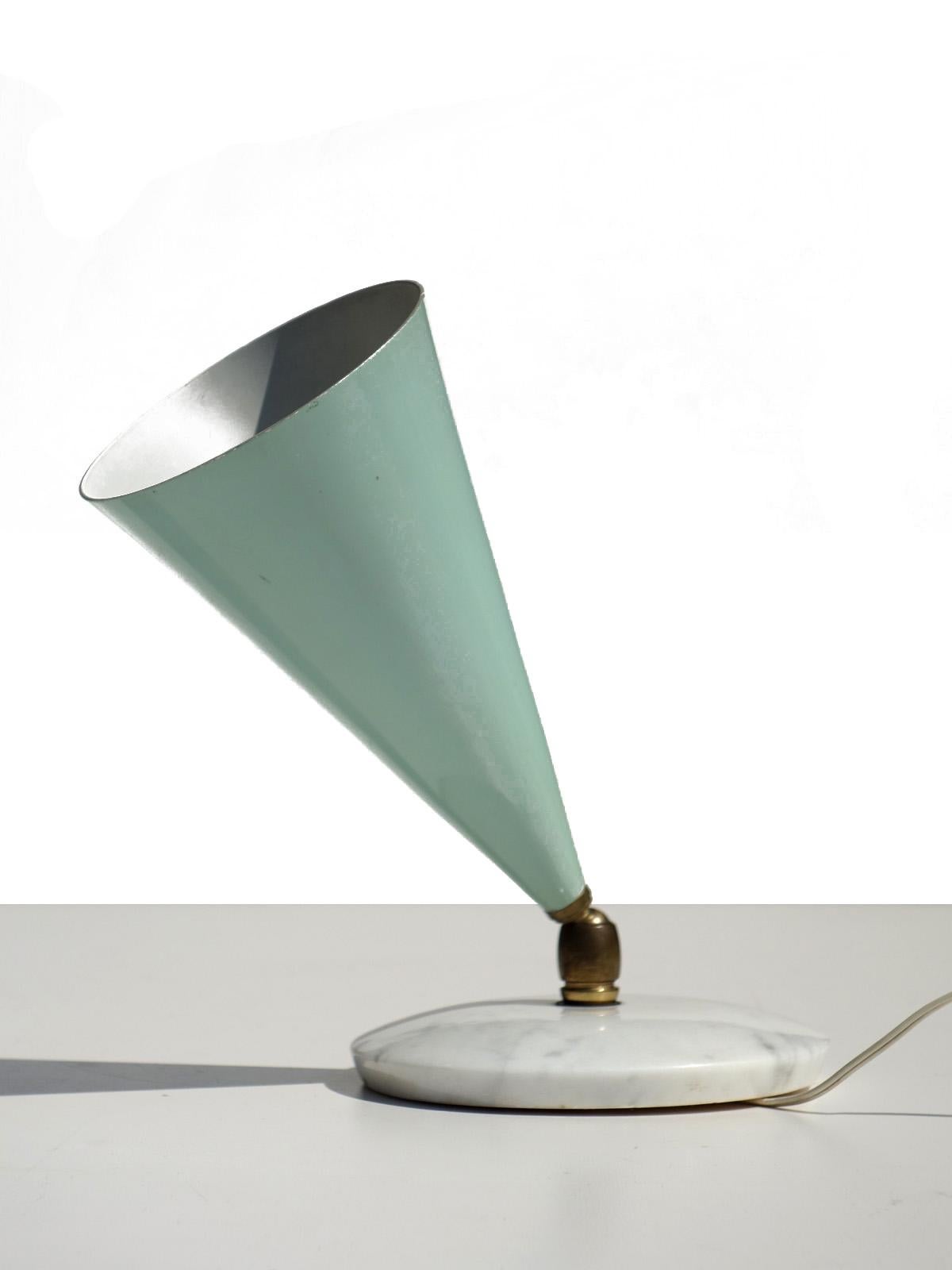 Table lamp by Arredoluce
Italy, 1950.

Aluminium shade and marble base
Excellent condition
Perfect working order.