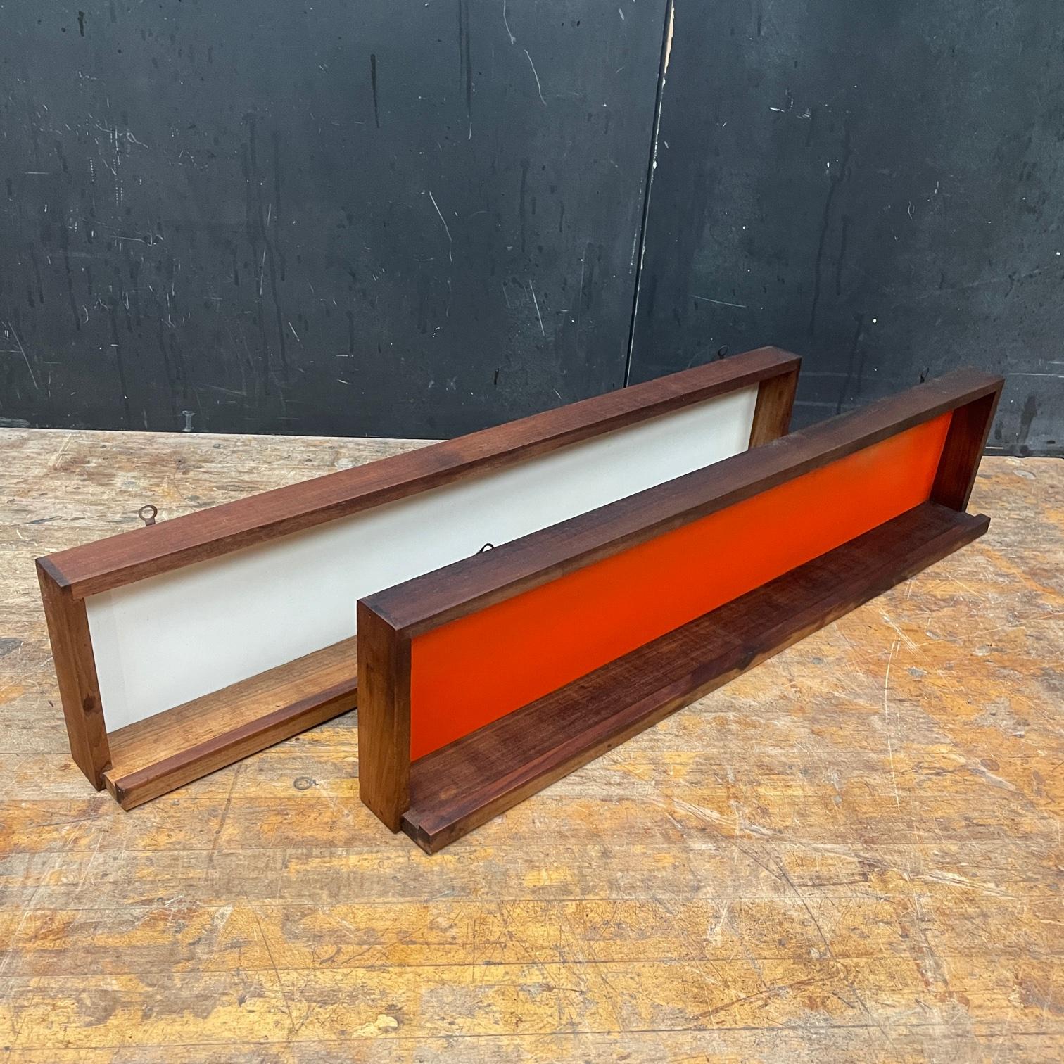 A pair of kitchen spice shelves in the manner of Peter Pepper Products. Or something out of a Charles Goodman Pot and Beam Home. No Labels present.

Measures: W 29 1/16 x H 6 3/8 x D 2 13/16 / Top Box D 1 5/8 in.
   