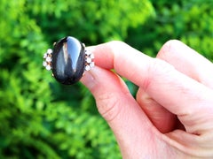 1950s Cabochon Cut Star Onyx and Diamond Yellow Gold Cocktail Ring