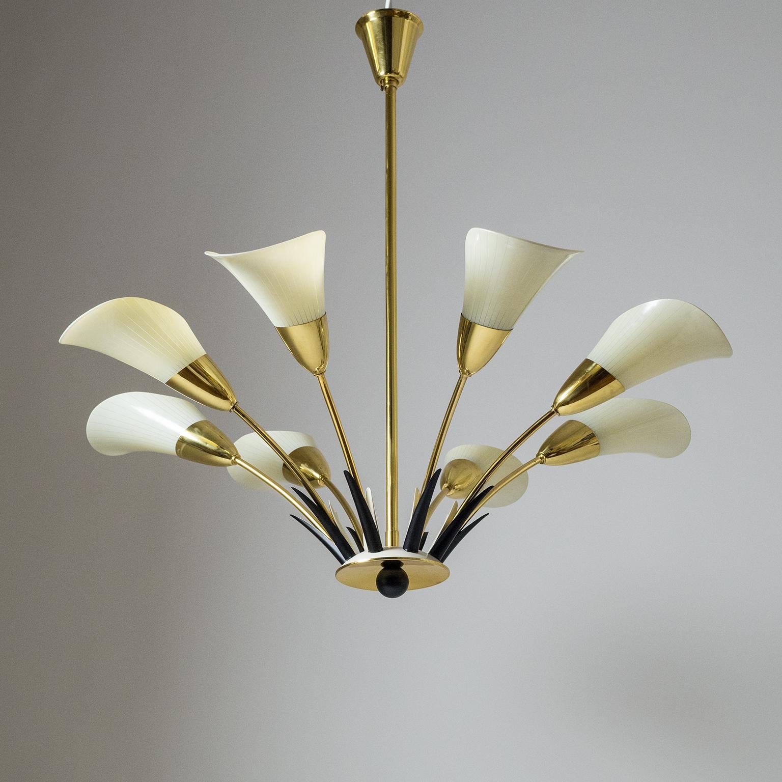 Rare eight-arm chandelier with Calla shaped glass diffusers which are enameled with an ivory colored pinstripe decor. Apart from the glass the chandelier is made entirely of brass including the lacquered parts. Beautiful delicate design with a very