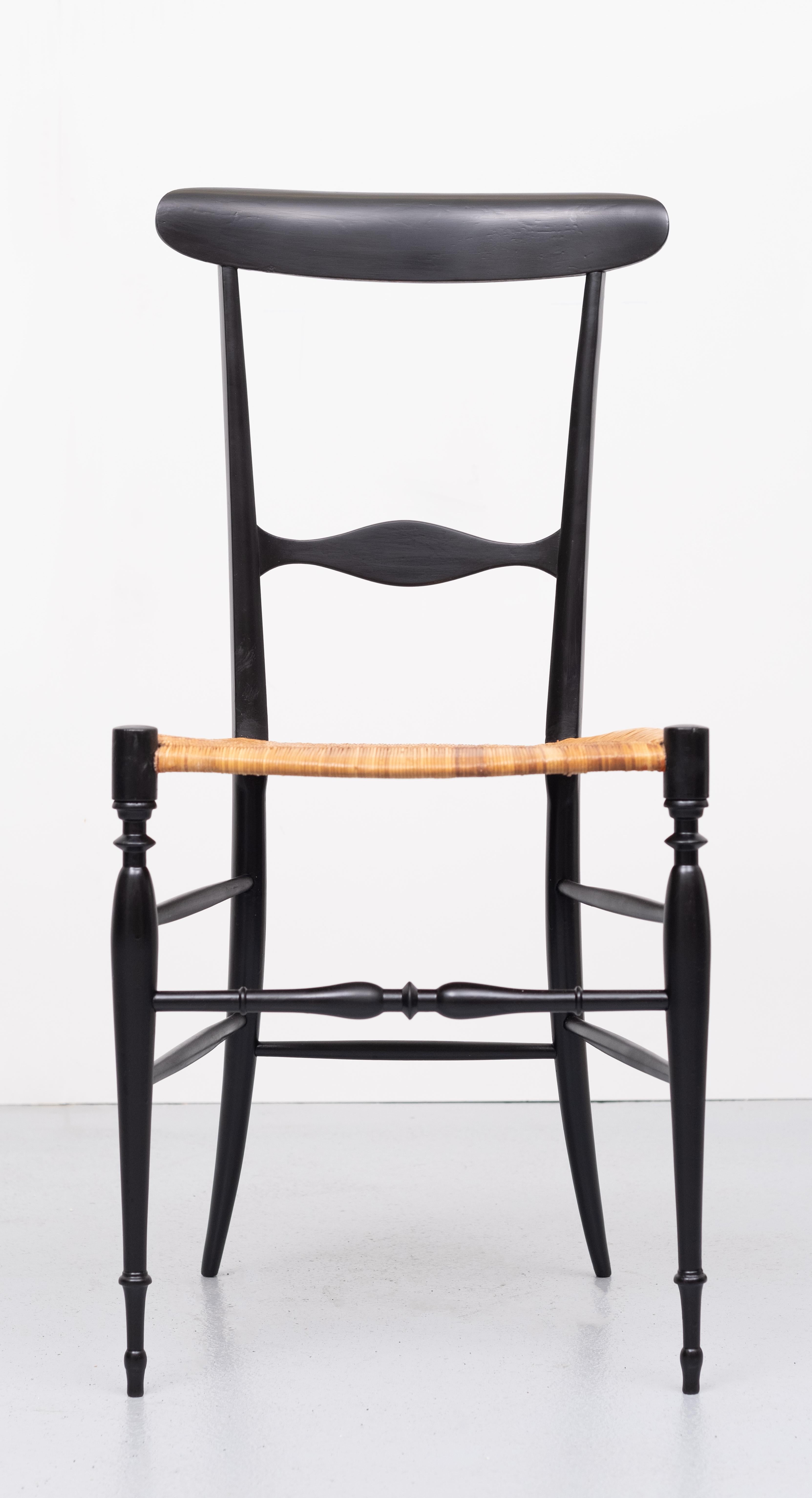 1950s Campanino Classica Chiavari chair by Fratelli Levaggi, Italy So elegant and light chair.
Satin black color. Comes with the original beautiful rush seating. Good condition.
 
