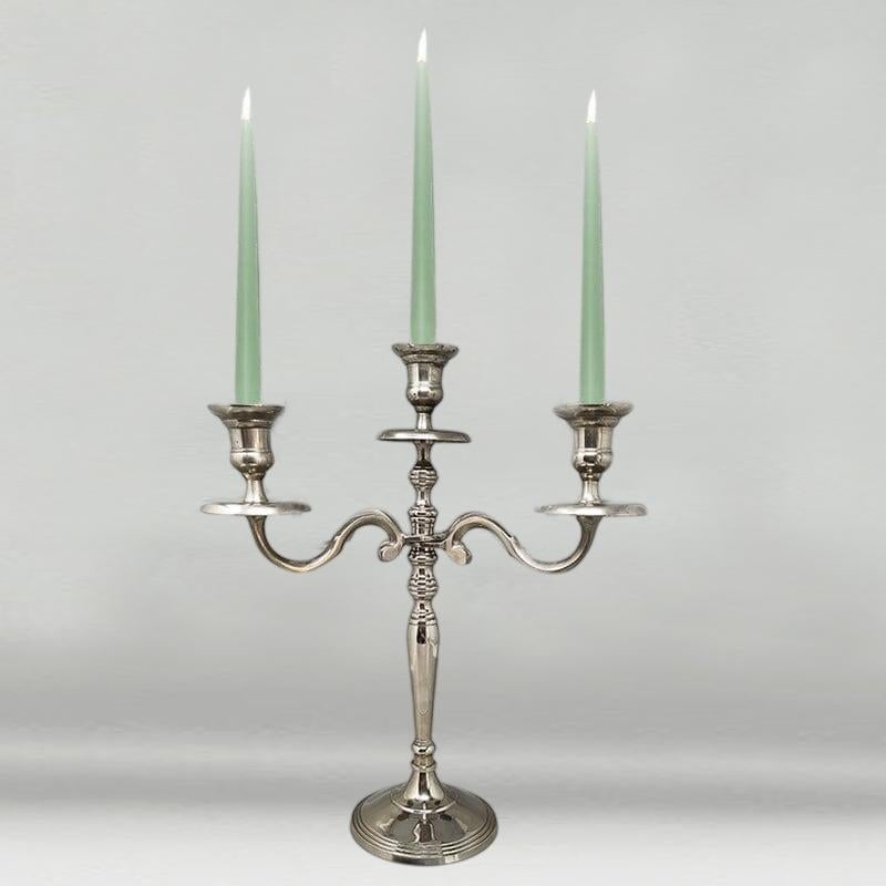 1950s Stunning candelabra for three candles in stainless steel. Handmade, in excellent condition. Made in Italy
Dimension:
13,77 x 5,11 x 16,92 inches (size without candles)
cm 35 x 13 cm x cm 43 H (size without candles)