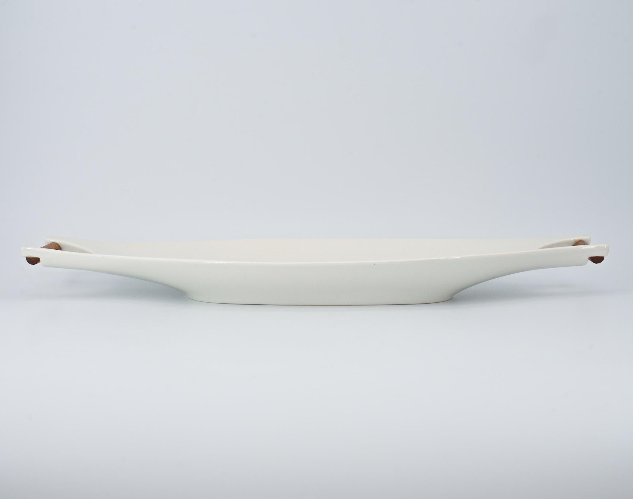 Sculptural masterpiece in tableware, with a classic mid-century mix of materials.
