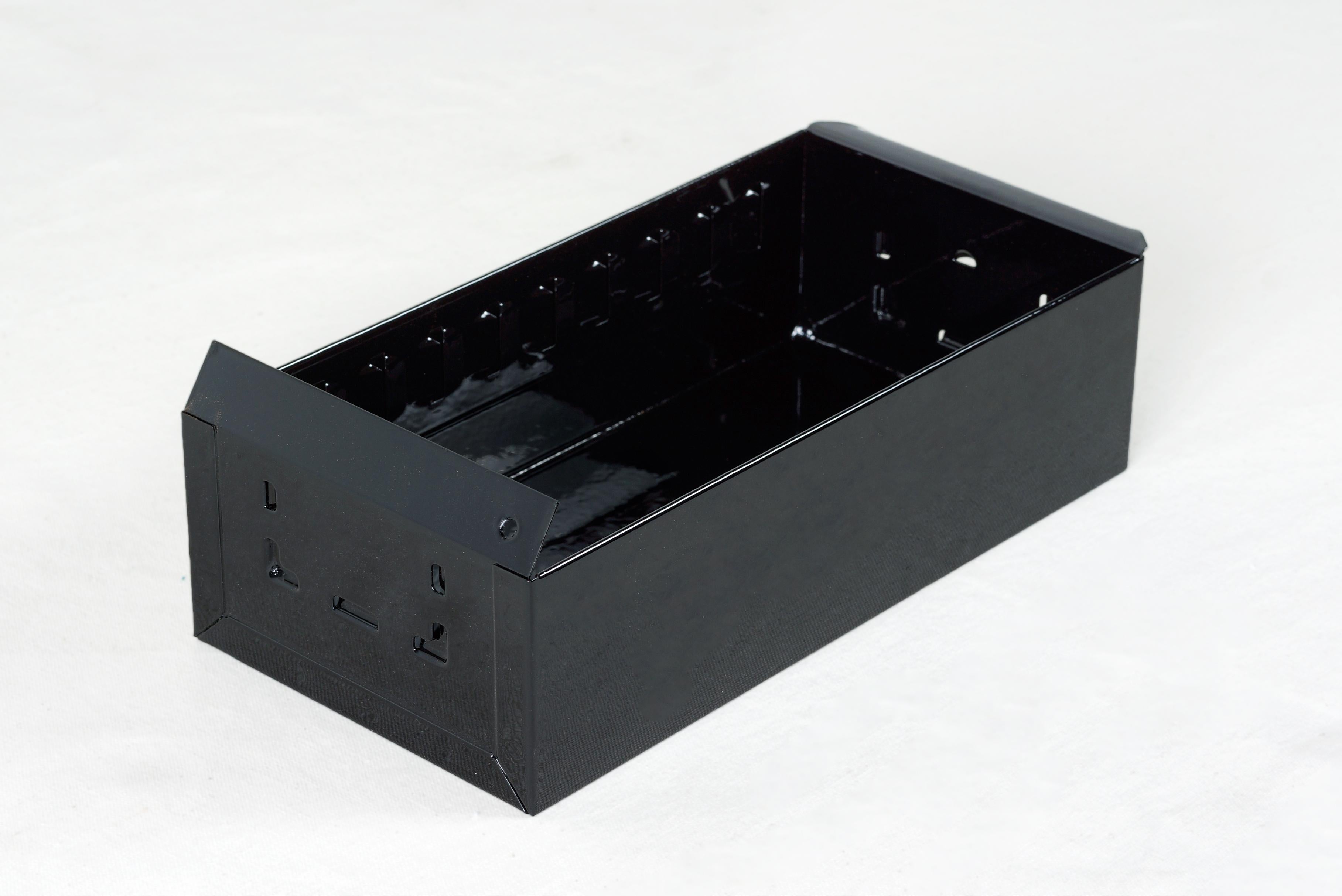 We refinished two matching 1950s steel filing drawers with a gloss black powder coat. These classic, heavy-duty organizational bins are perfect for storing anything from office supplies to recipe cards. 

Two available. Sold separately.