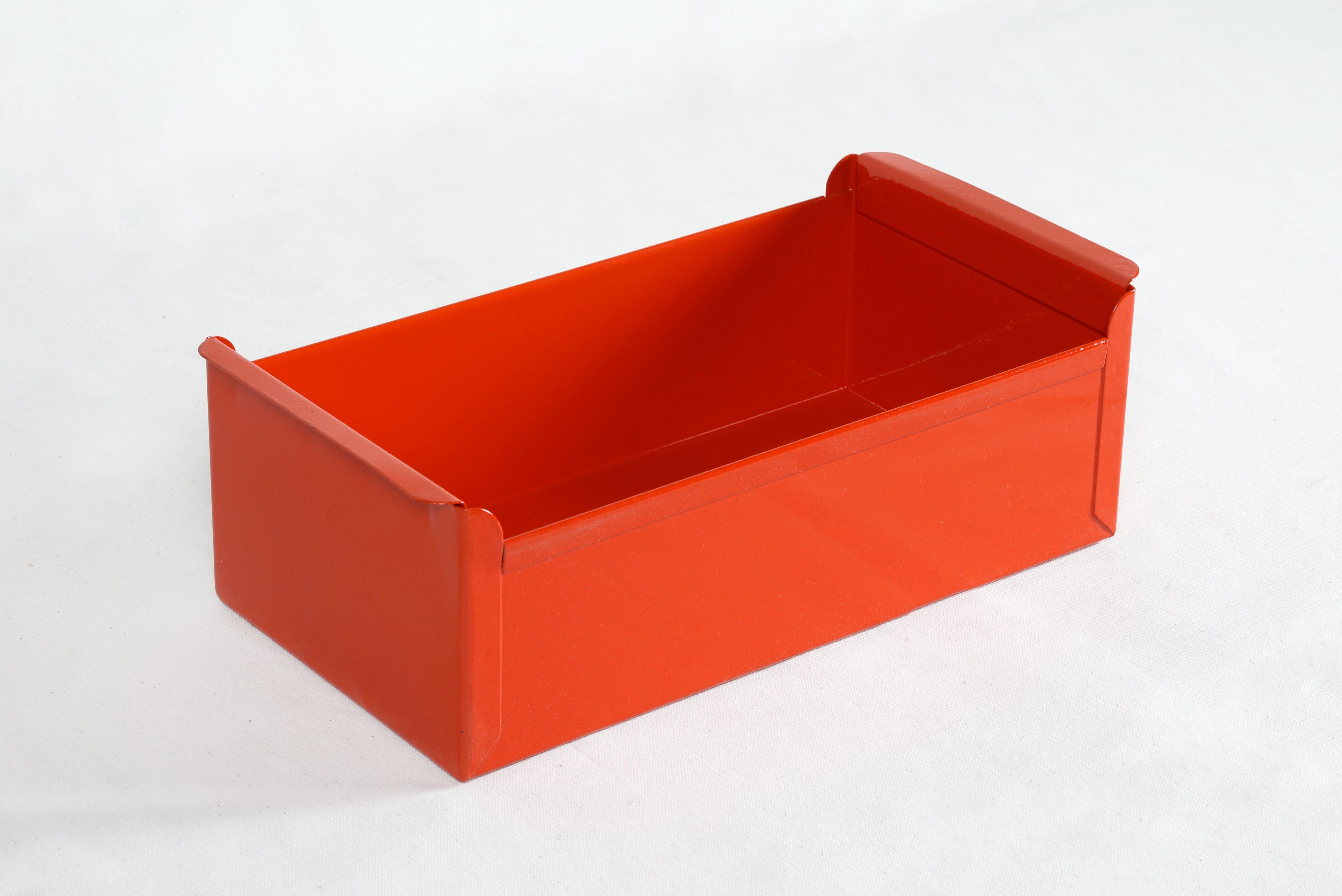 We refinished two matching 1950s steel filing drawers with a gloss fire engine red powder coat. These Classic, heavy-duty organizational bins are perfect for storing anything from office supplies to recipe cards. 

Two available. Sold separately.