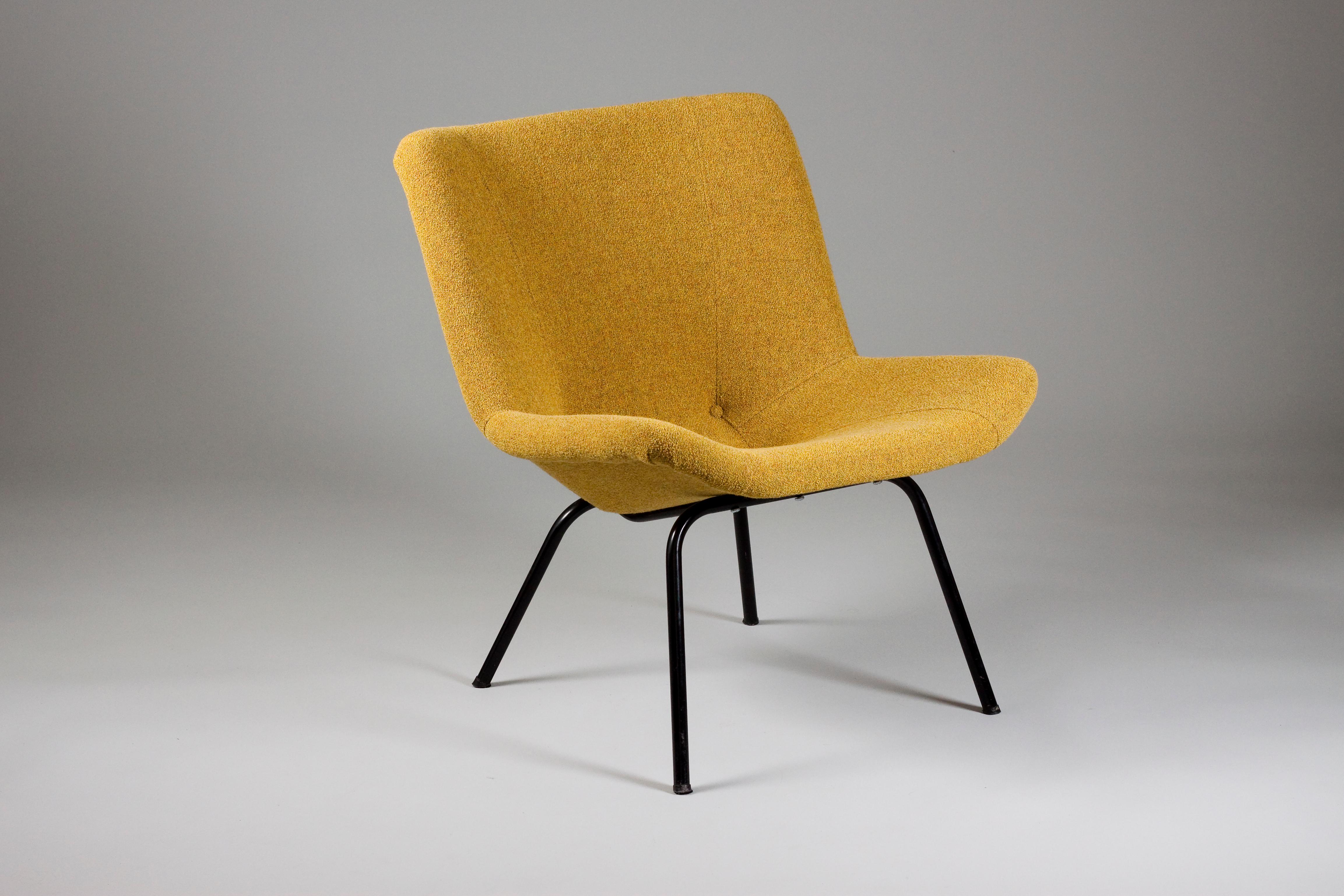 Comfortable minimalistic Scandinavian modern easy chair 