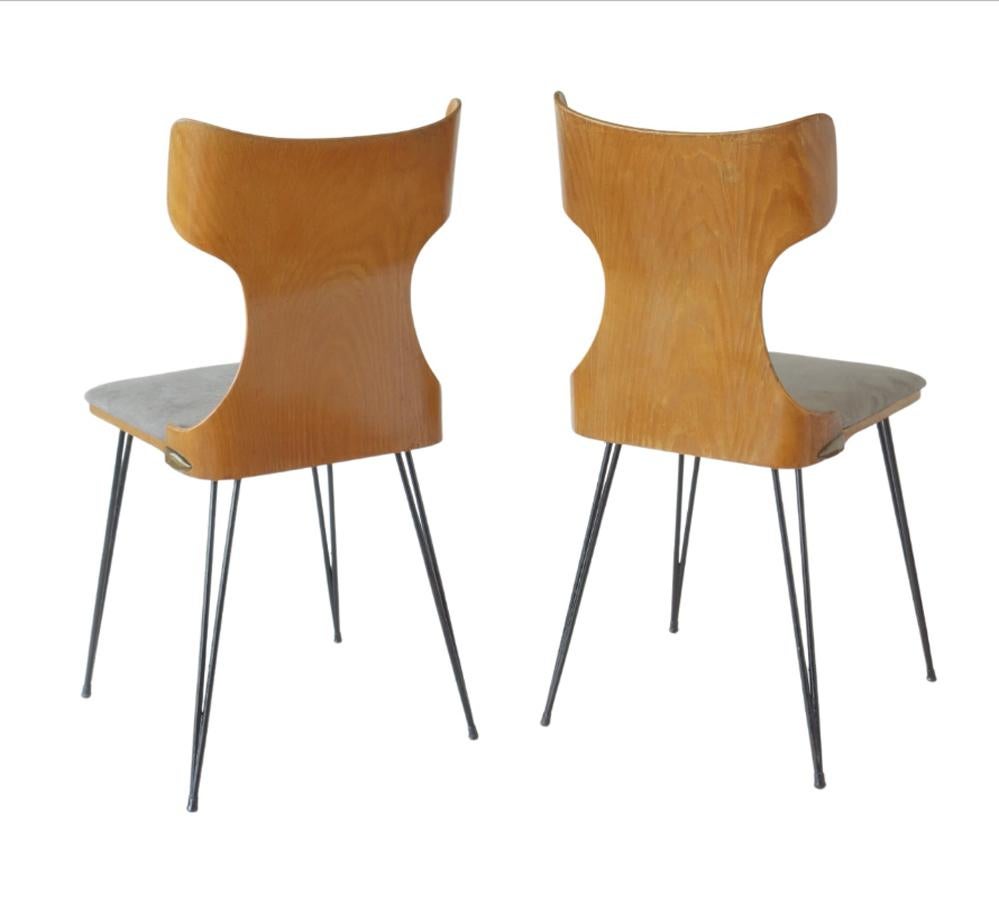 Pair of Chairs
Carlo Ratti
Italy, 1950s

Bentwood seat with grey fabric
Black Iron Frame
Very good condiction.


