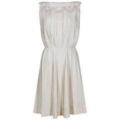 1950s Carlye Cremefarbenes Baumwollkleid mit Messerfalten