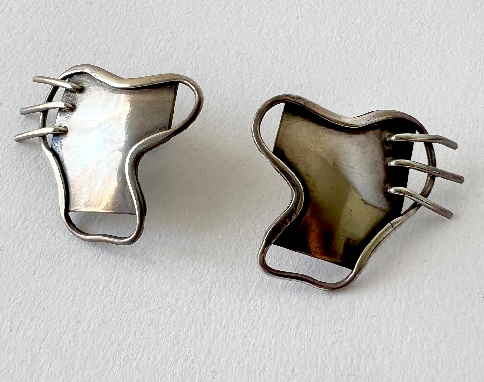 large silver clip on earrings
