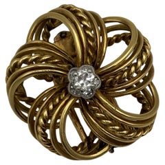 1950s Cartier 18k gold broochwith 0.20 carats diamonds