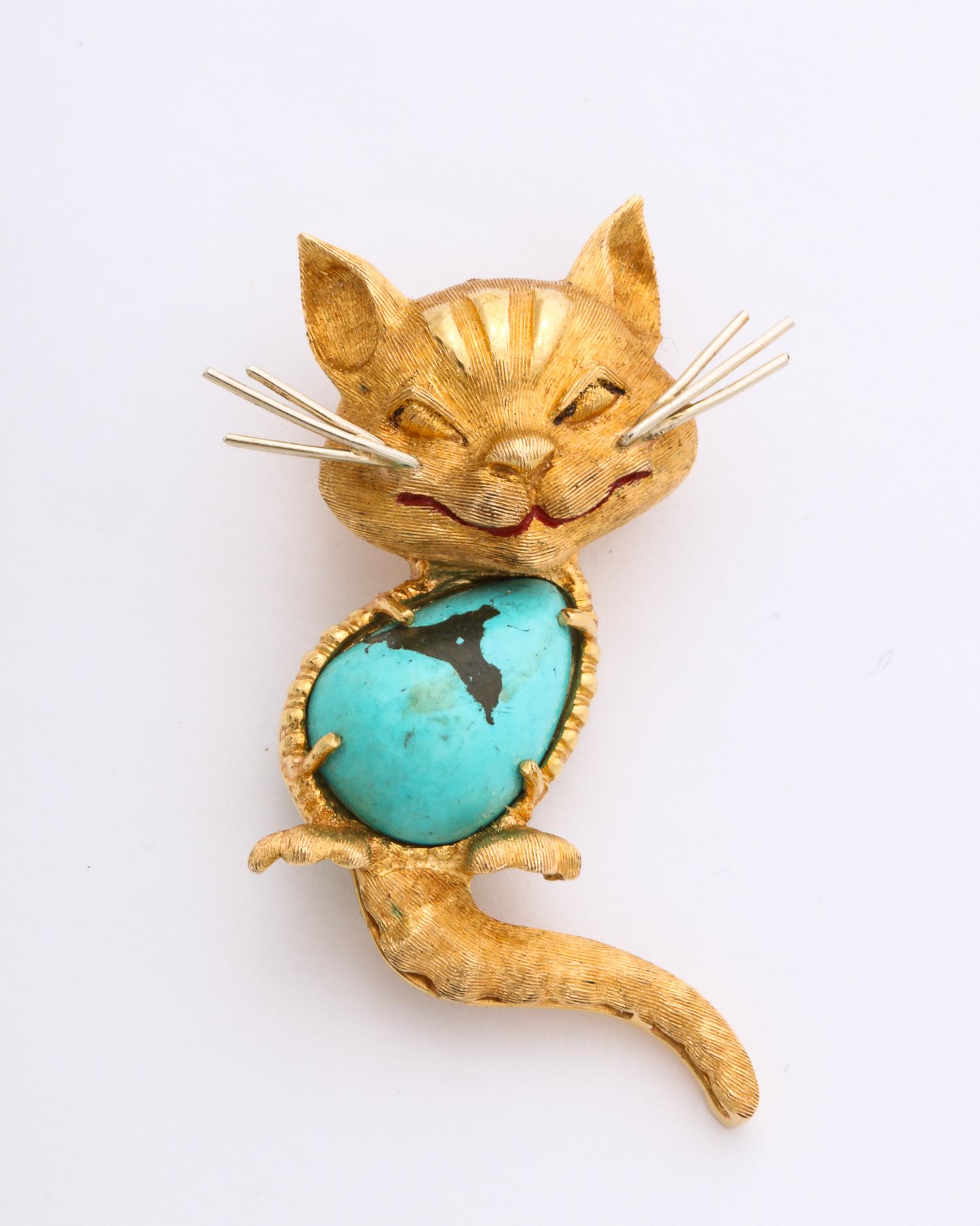 One Whimisical And Figural Kitty Cat Brooch Created With One Large Cabochon Natural Turquoise Stone Measuring Approx. 15Mm. Designed In 18kt Textured Gold Kitty Cat Is Smiling In A Cat That Swallowed The Canary Motif.Designed In The 1950's Stamped