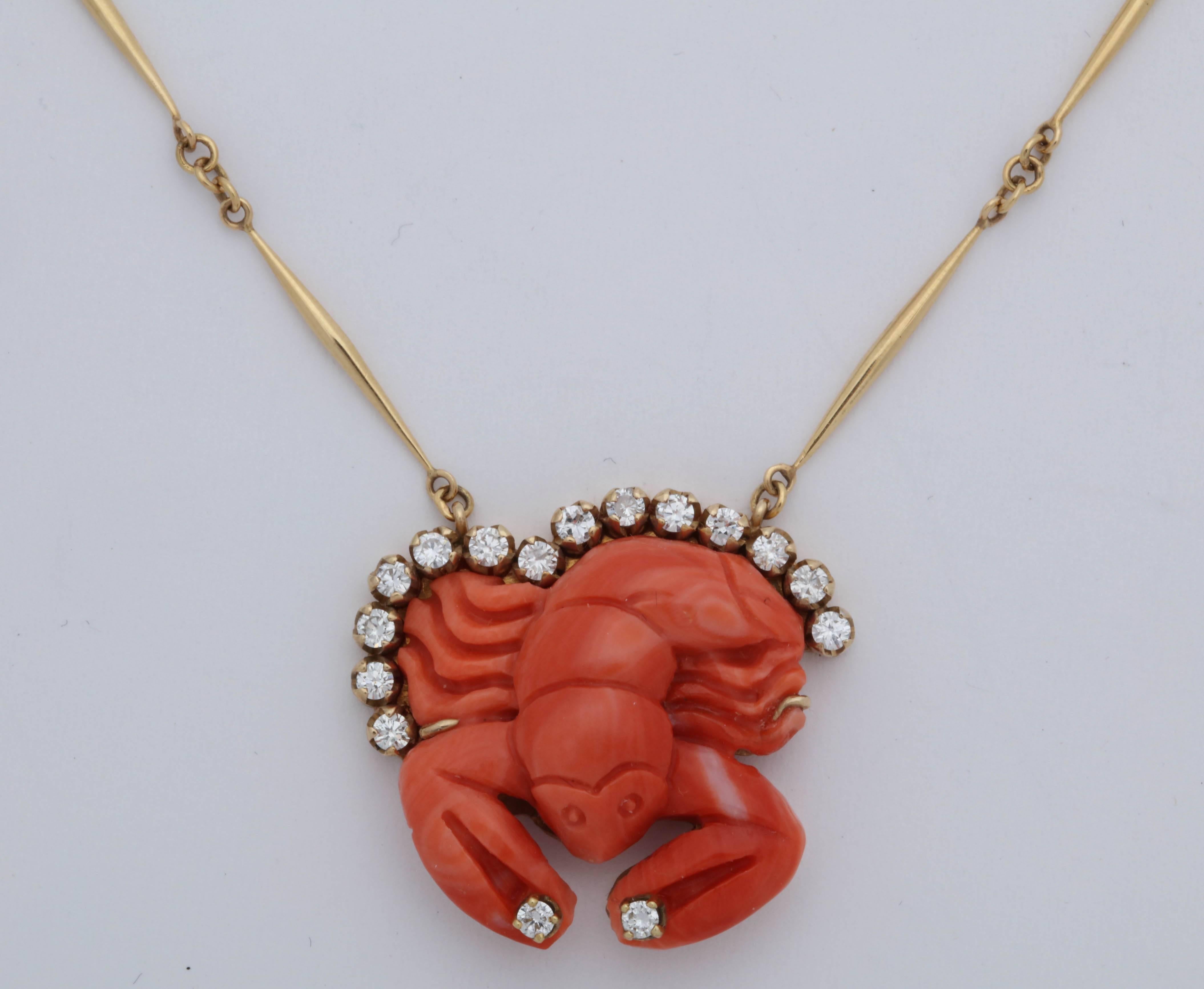 One Ladies 18kt Yellow Gold Link Necklace Designed With A Whimsical Carved Coral Figural Lobster. Color Of Coral resembles A True Lobster Color Pendant _ Necklace is Beautifully Designed With Sixteen Full cut Diamonds Weighing Approximately 1.00