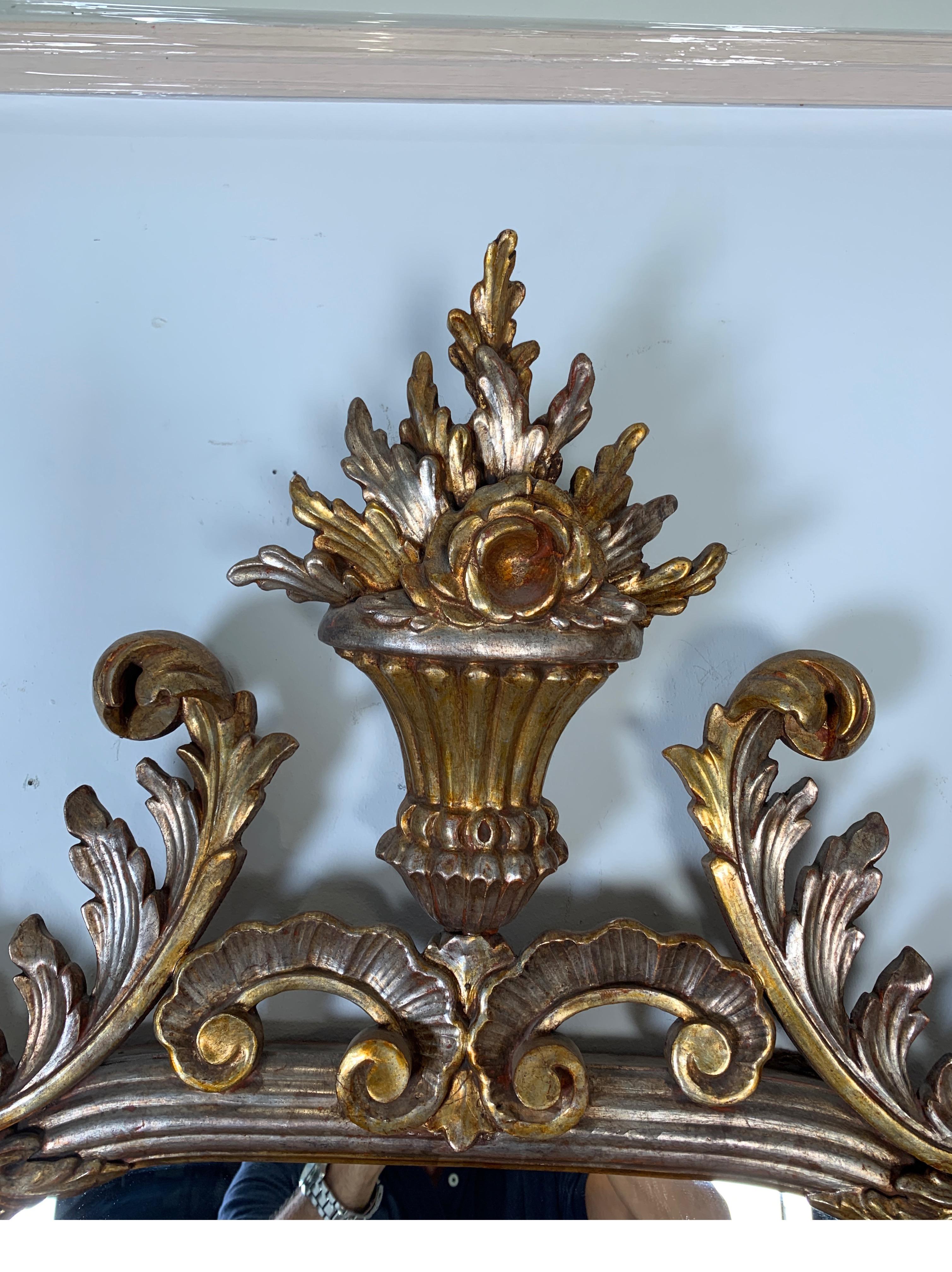 1950s Carved Louis XV Style Silver and Gold Gilt Italian Decorative Mirror In Good Condition In Lambertville, NJ