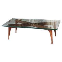 Table basse en bois sculpté et verre des années 1950 attribuée à Fontana Arte