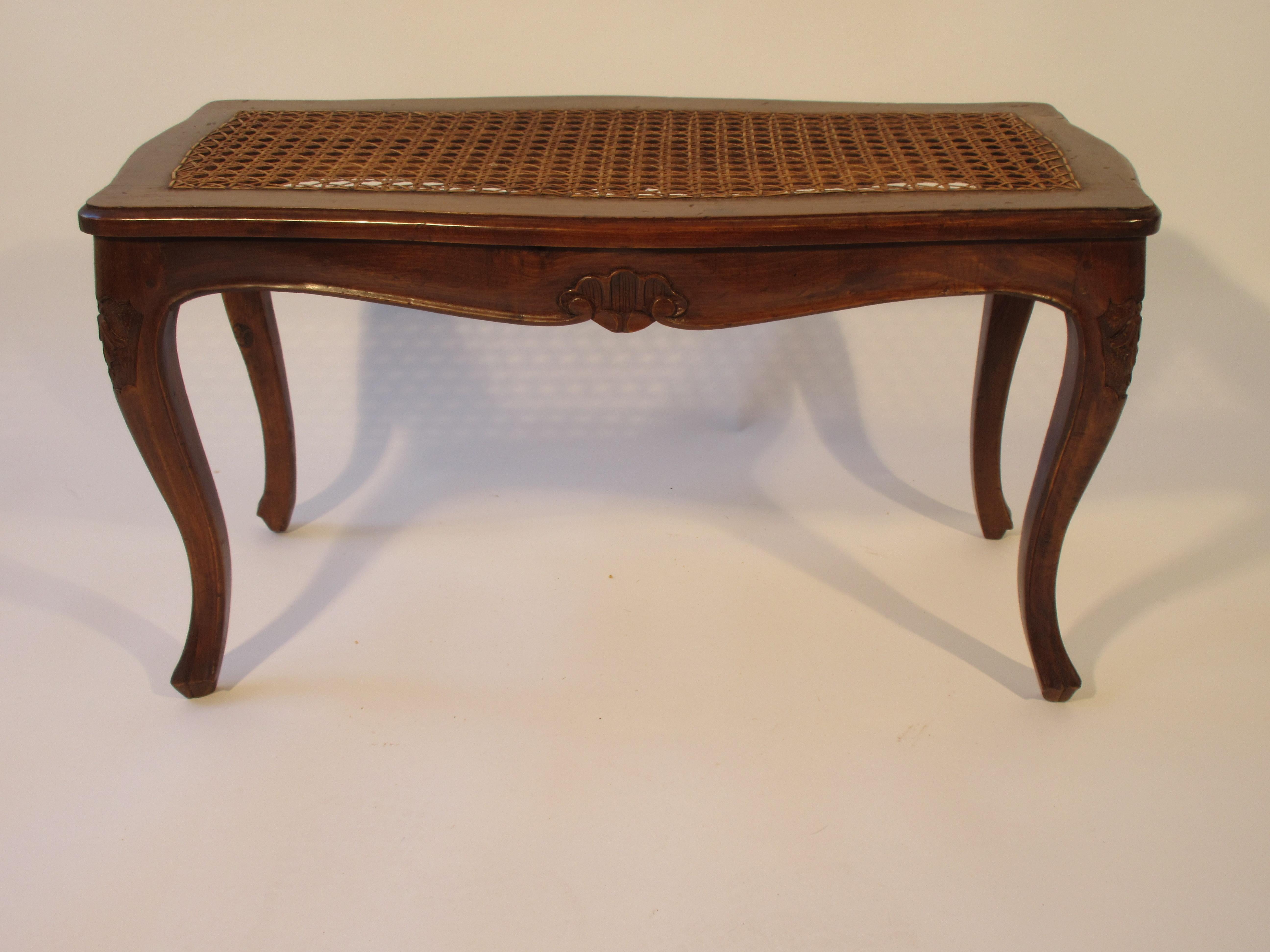 1950s carved wood caned seated bench.