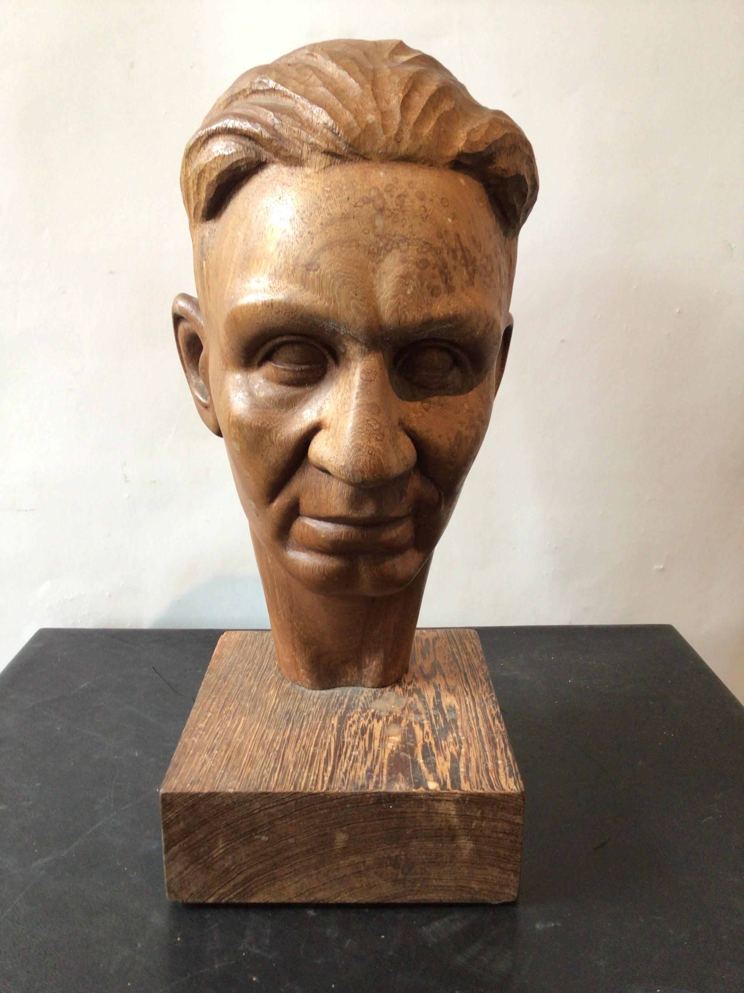 1950s Carved wood sculpture o a man’s head. Signed by artist.