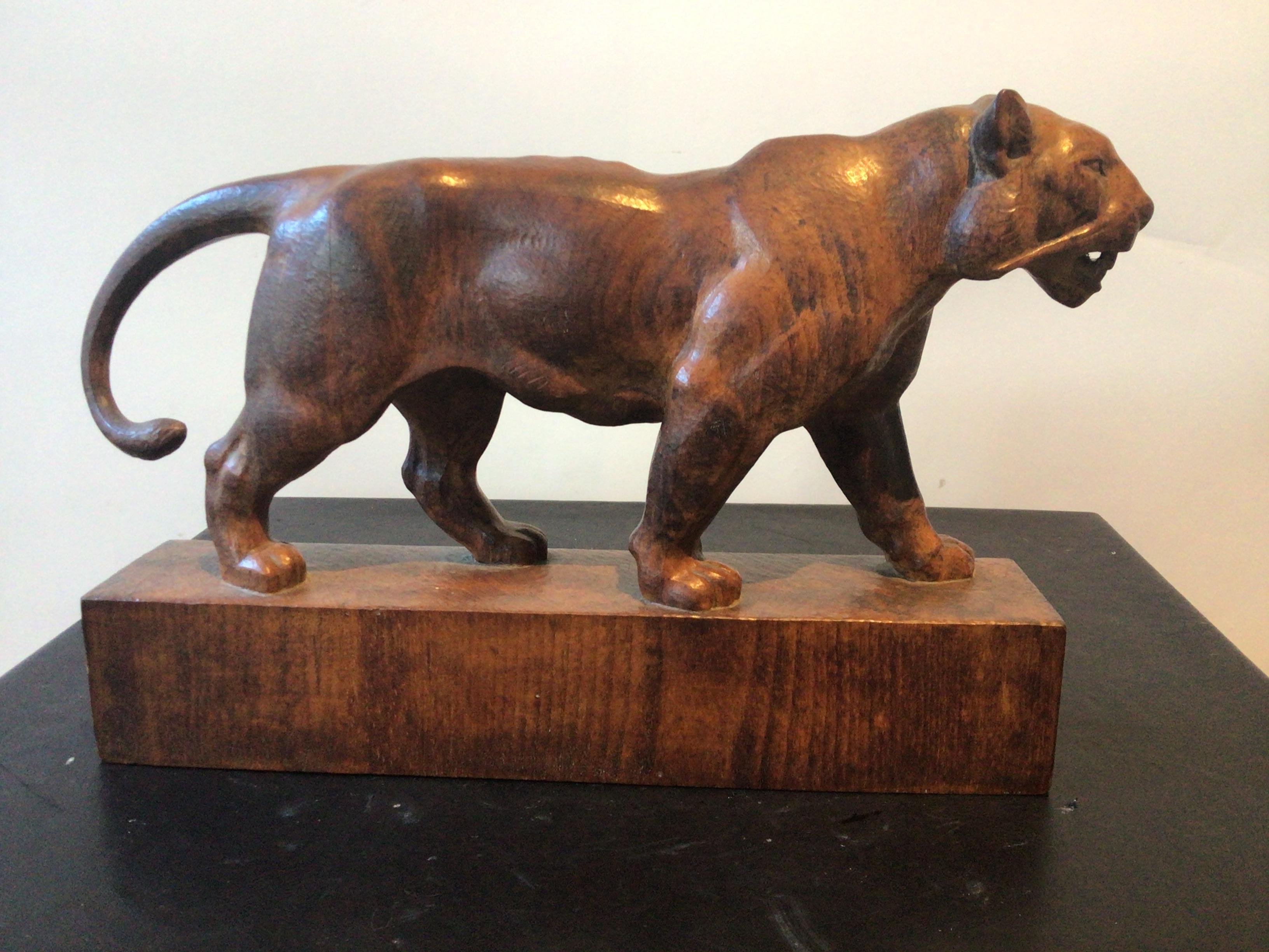1950s carved wood sculpture of a tiger.