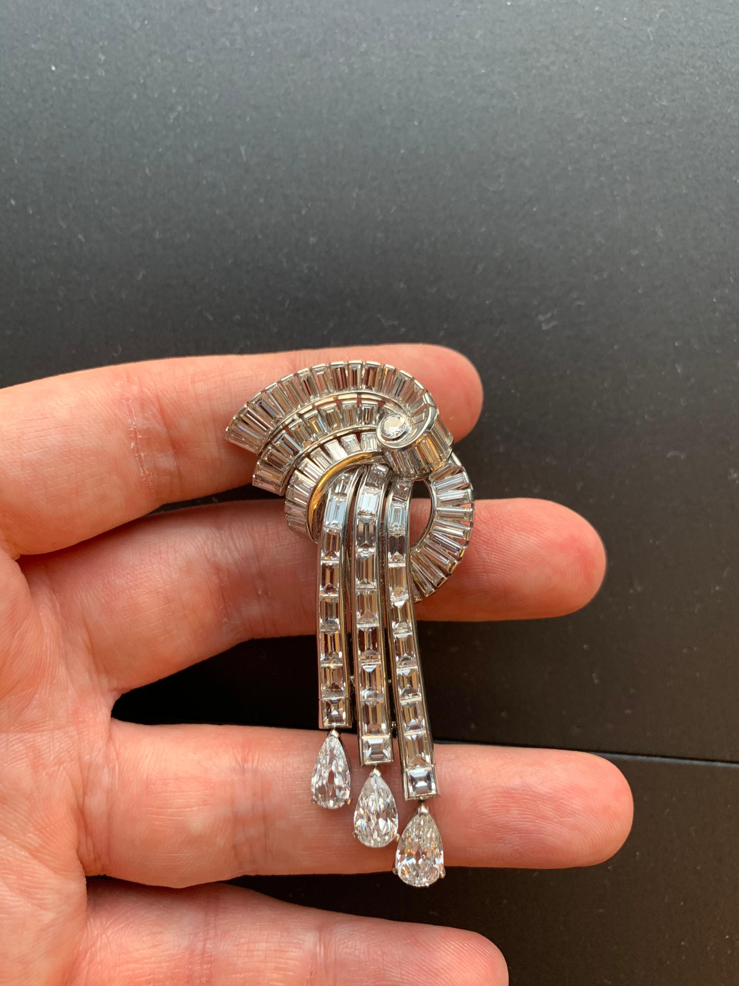 1950's Cascade Diamond Brooch
Approx 13 ct diamonds,. G-H color. VS1 clarity.
2.6 inches long
1 inch wide at its widest
Engraved with unidentified serial numbers
Sterle-esque