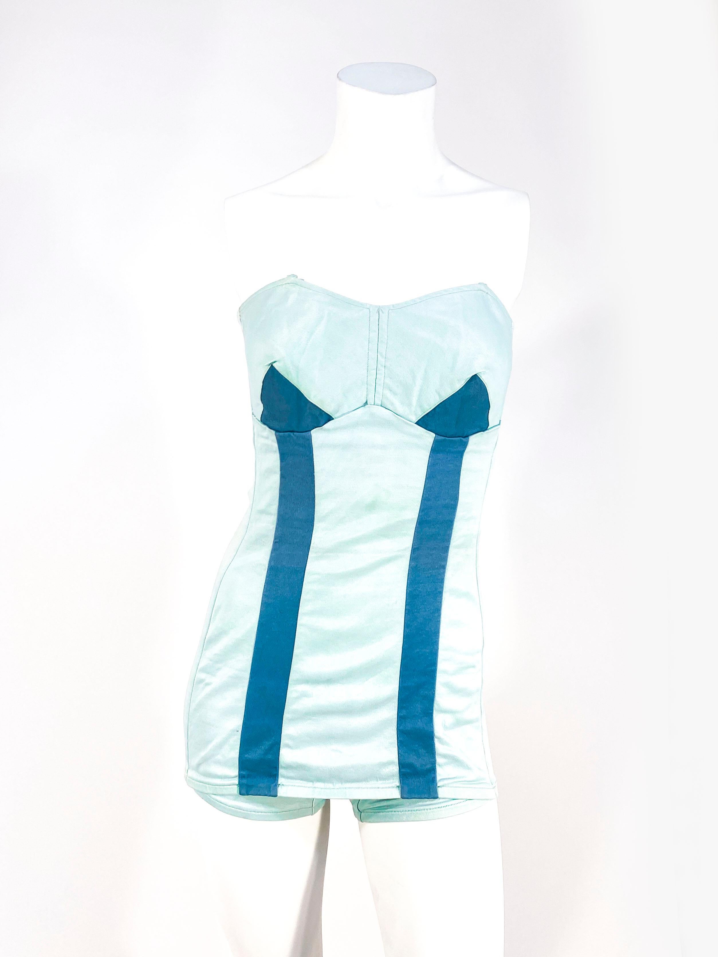 1950s Catalina robins egg blue bathing suit with a double arrow accent in teal. The interior tag says 