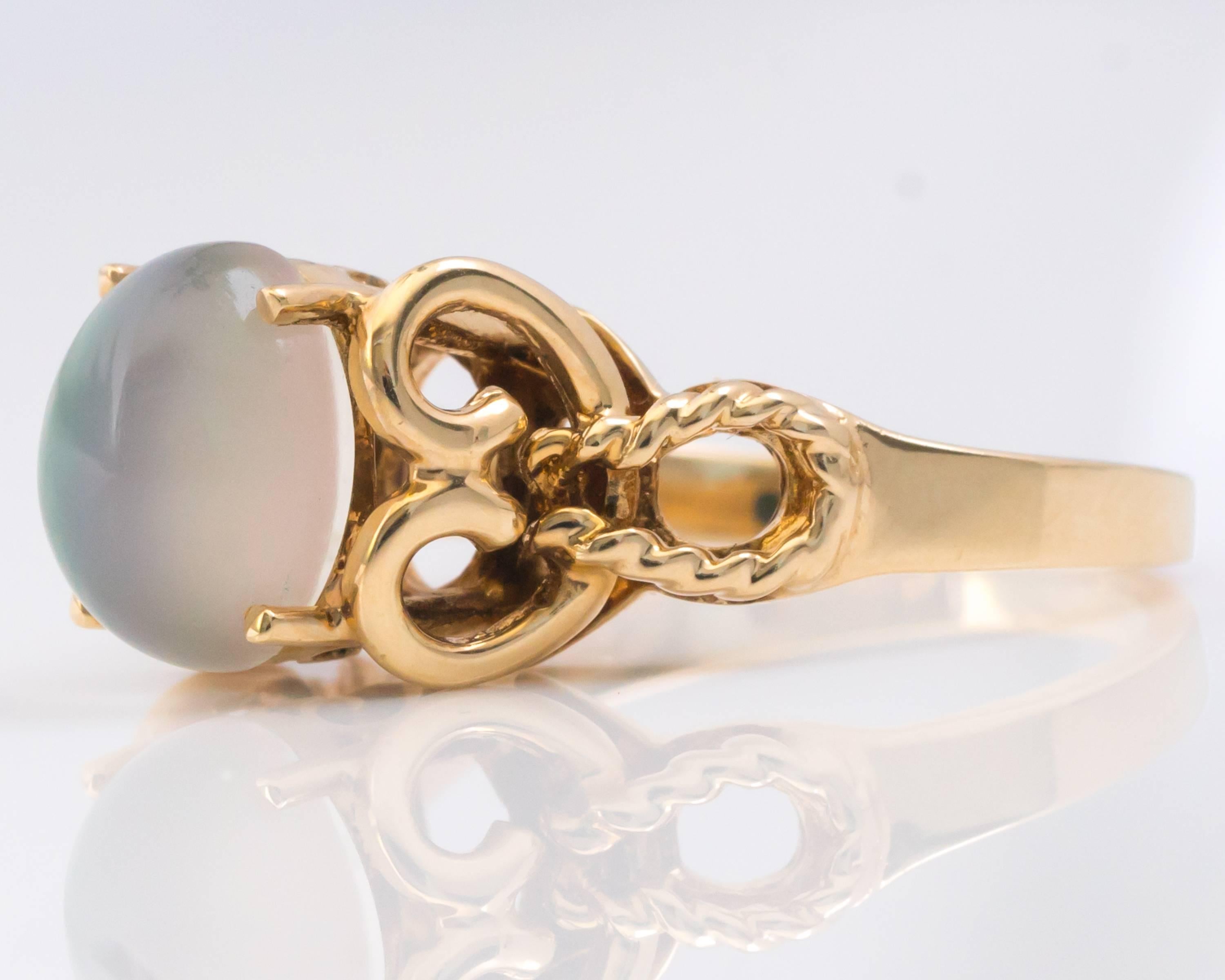 Women's 1950s Cat's Eye and 10 Karat Yellow Gold Moonstone Ring