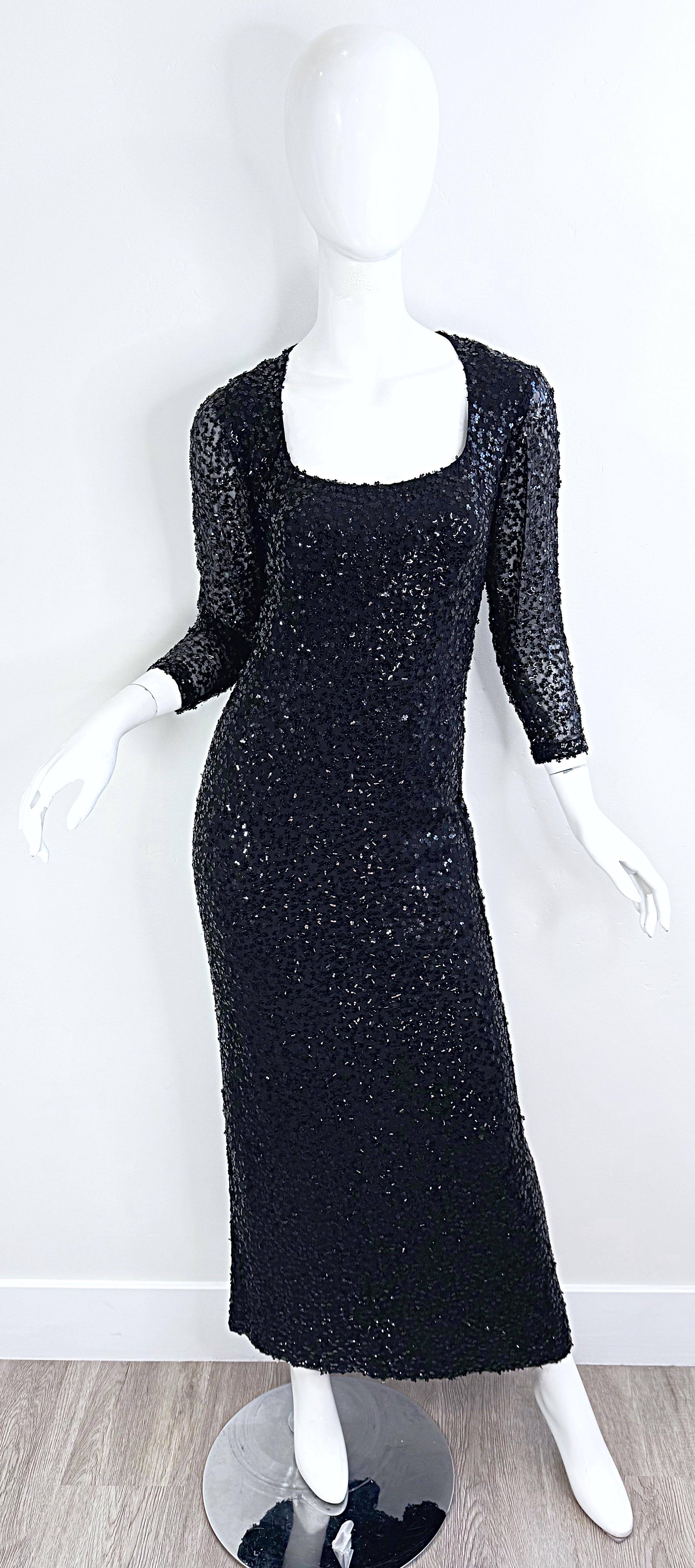 Rare museum quality early 50s vintage Ceil Chapman black silk chiffon sequin evening gown. Impeccable tailoring and fit one would expect from Chapman. Tailored bodice with long semi sheer sleeves. Thousands of hand-sewn jet black sequins throughout