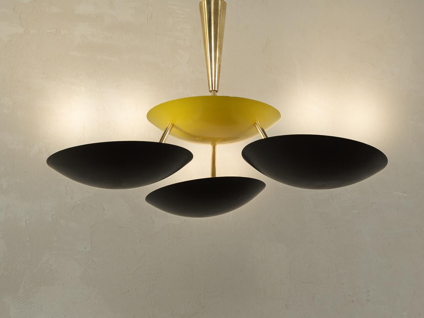 Rare three flame ceiling lamp by Stilnovo from the 1950s. High-quality metal frame with three lampshades made of pressed stainless steel sheet in yellow and black. Made in Italy, manufacturer: Stilnovo
Condition & Size

Good condition with slight