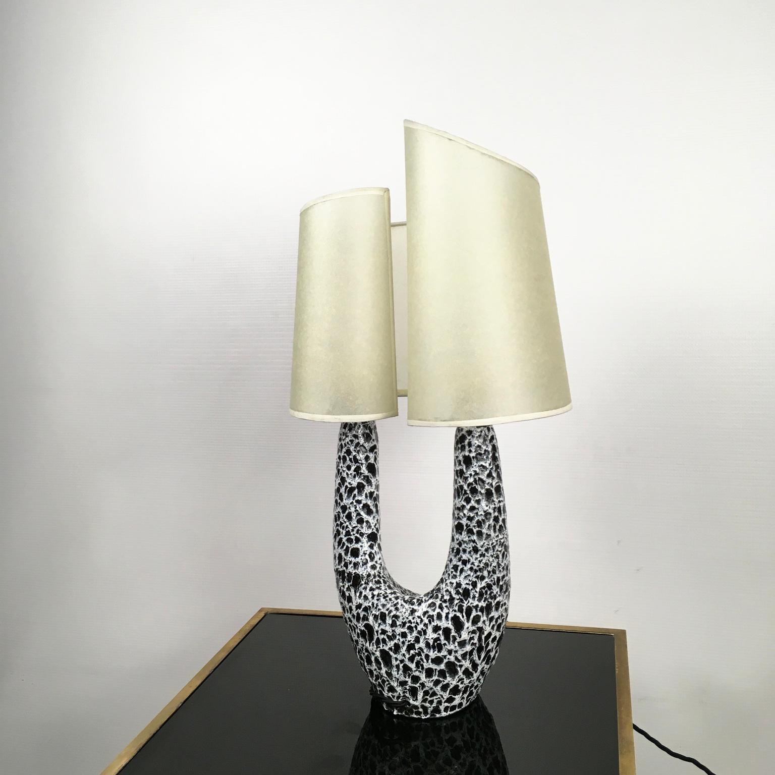 1950s ceramic table lamp by the french artist Le Vaucour for Vallauris...
Black and white glaze base with its own original lampshade.
 