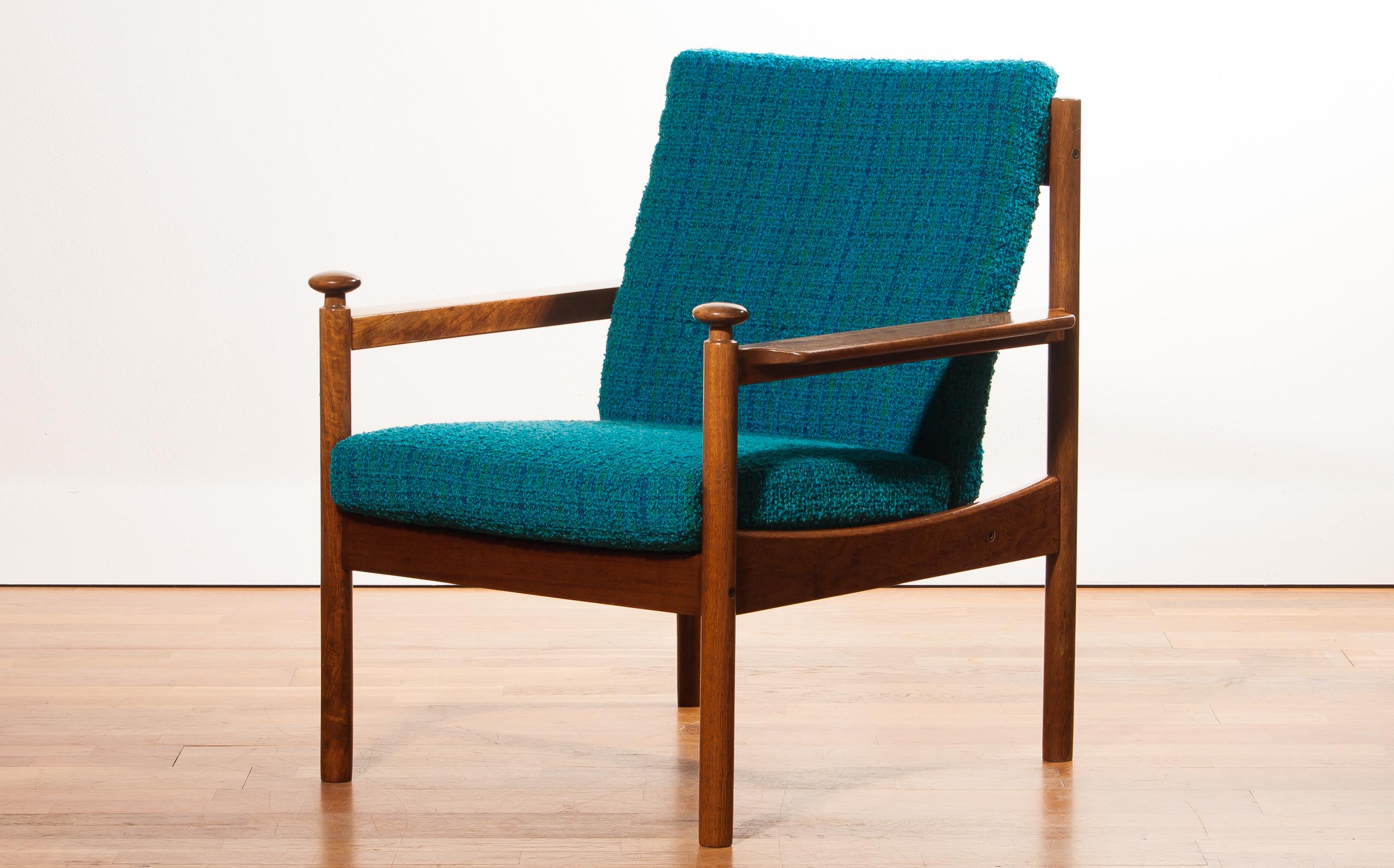 Beautiful chair designed by Torbjørn Afdal for Sandvik & Co. Mobler, Norway.
The wooden frame with the blue fabric cushions makes it a very nice combination.
It is in good condition wear consistent with age and use.
Period 1950s
Dimensions: H 83