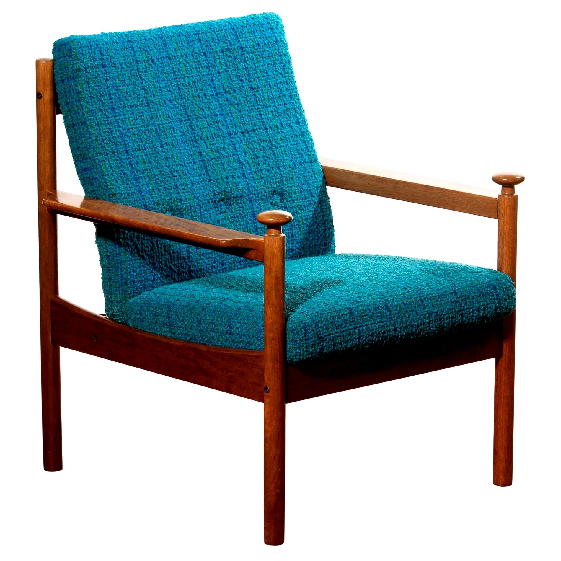 Beautiful chair designed by Torbjørn Afdal for Sandvik & Co. Mobler, Norway.
The wooden frame with the blue fabric cushions makes it a very nice combination.
It is in good condition wear consistent with age and use.
Period: 1950s.
Dimensions: H