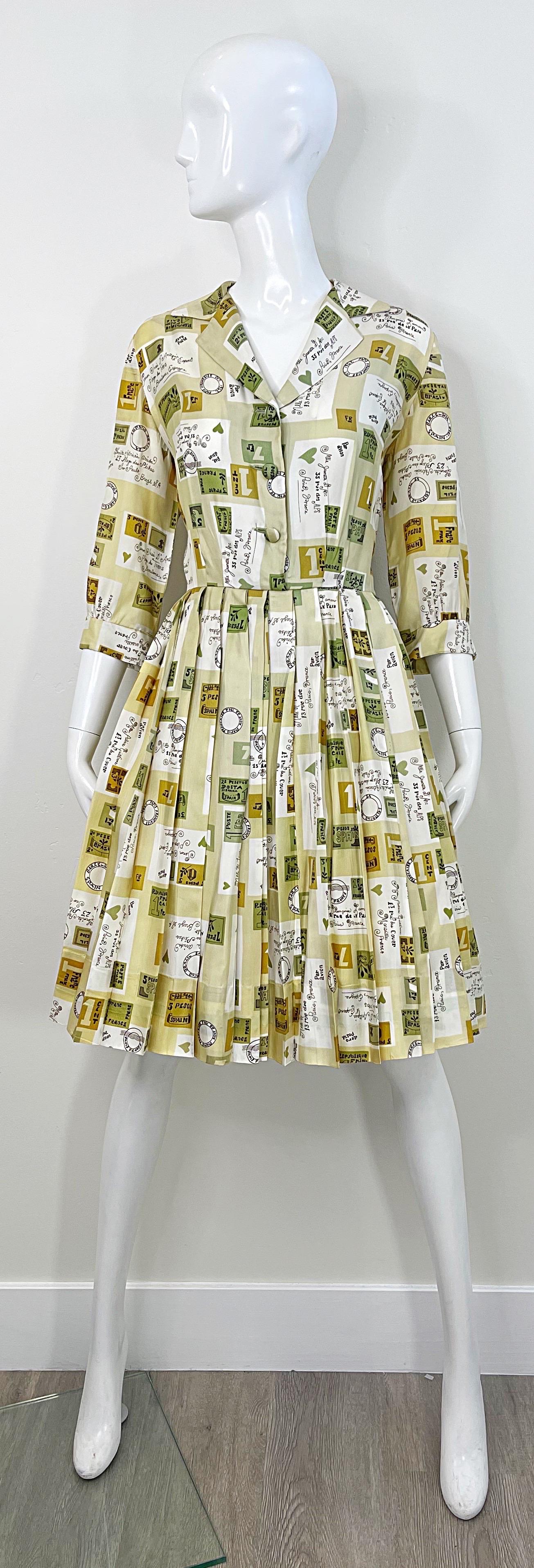 Chic and rare CHARLES HYMEN novelty postcard print fit n’ flare silk dress ! Features prints of different postcards and letters throughout. Buttons up the front center bodice. Hidden metal zipper up the side. Extremely well constructed with heavy