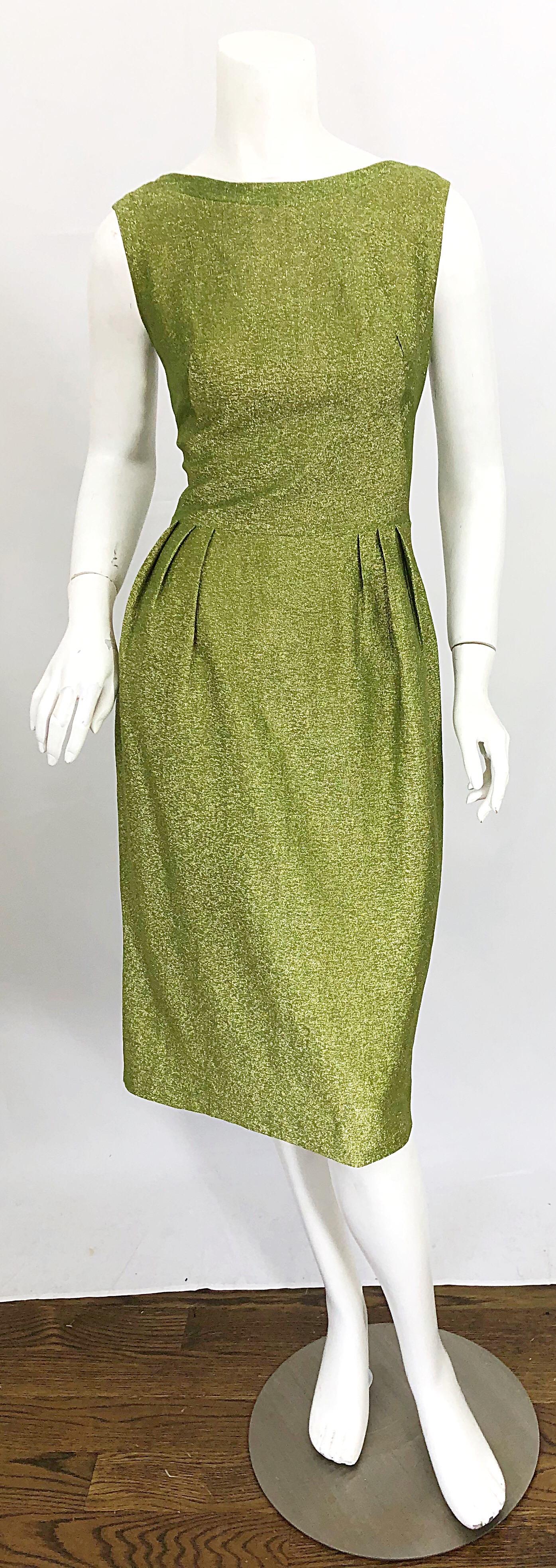 Chic early 1960s chartreuse / avocado green metallic silk lurex plunging back cocktail dress! Features a tailored bodice with a low-cut back. Hidden metal zipper up the back with hook-and-eye closure. Fully lined, and very well made. 
Can easily be