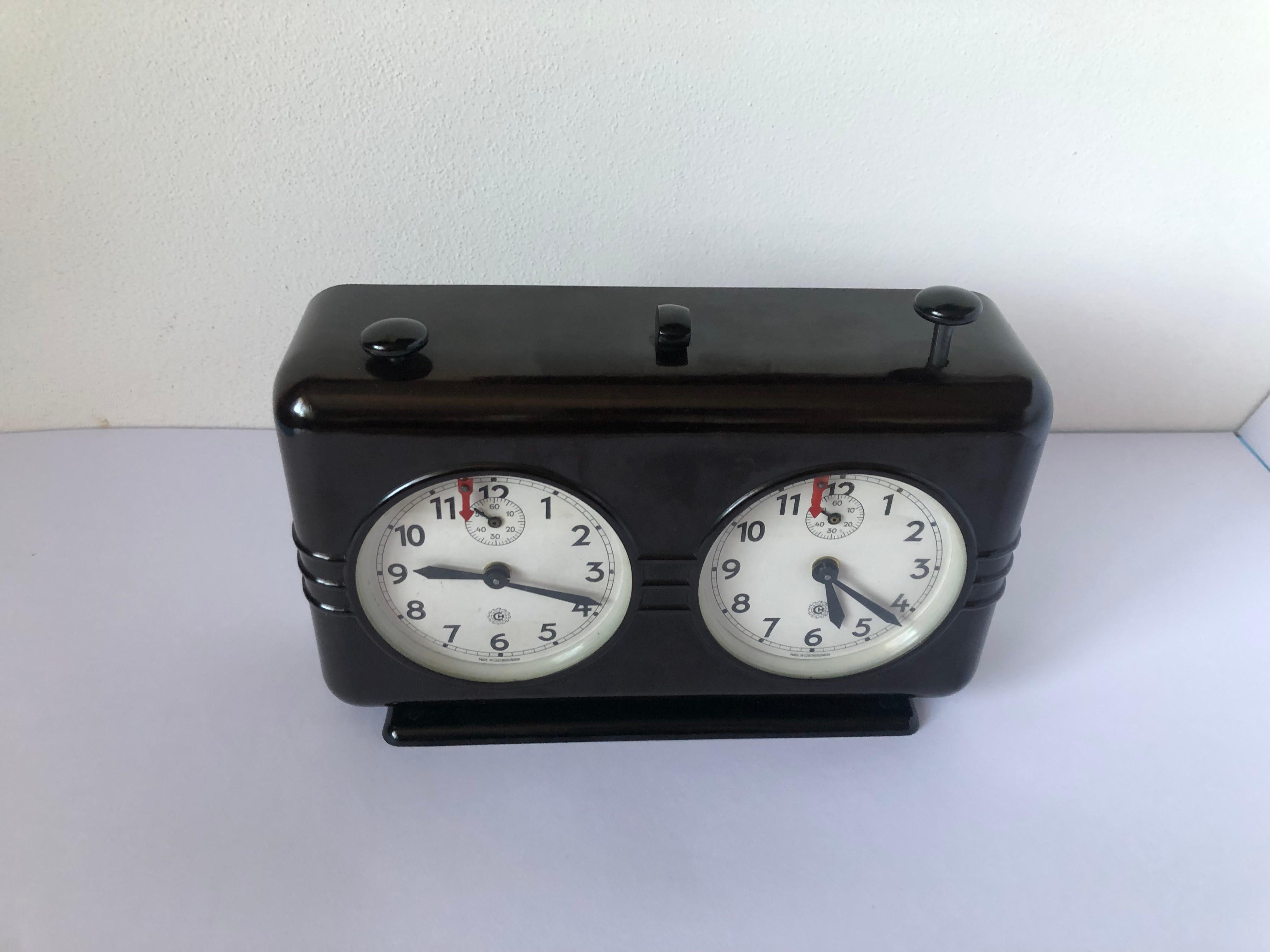 - Czechoslovakia chess clock from 1950 by Prim Chronotechna.
- The case is from bakelite.
- Both side of the clock are mechanical and they are in good working condition.