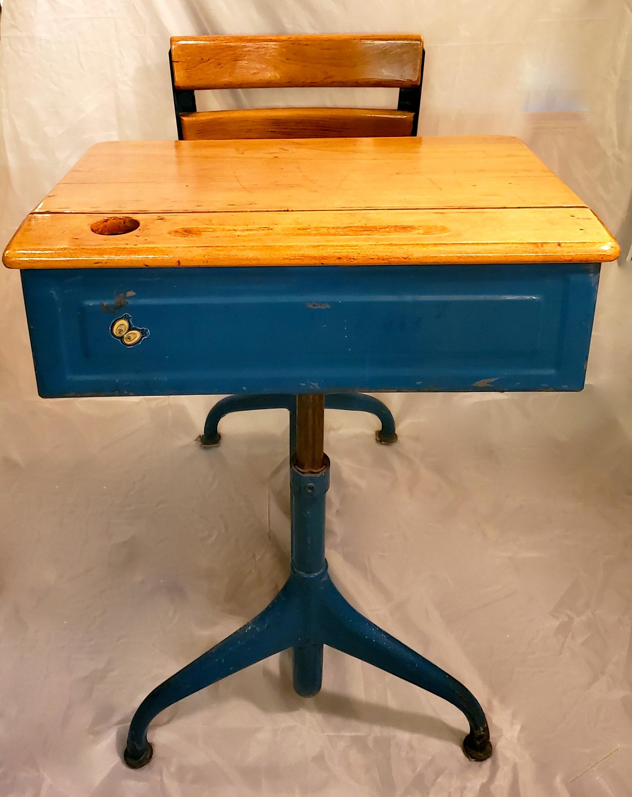 Midcentury Vintage children's school desk chair. Untouched paint and original parts. Great condition. The wooden desk has the original hinges . This great desk is usable and fully functional. 

seat height measures - 15 inches 
desk area - 18